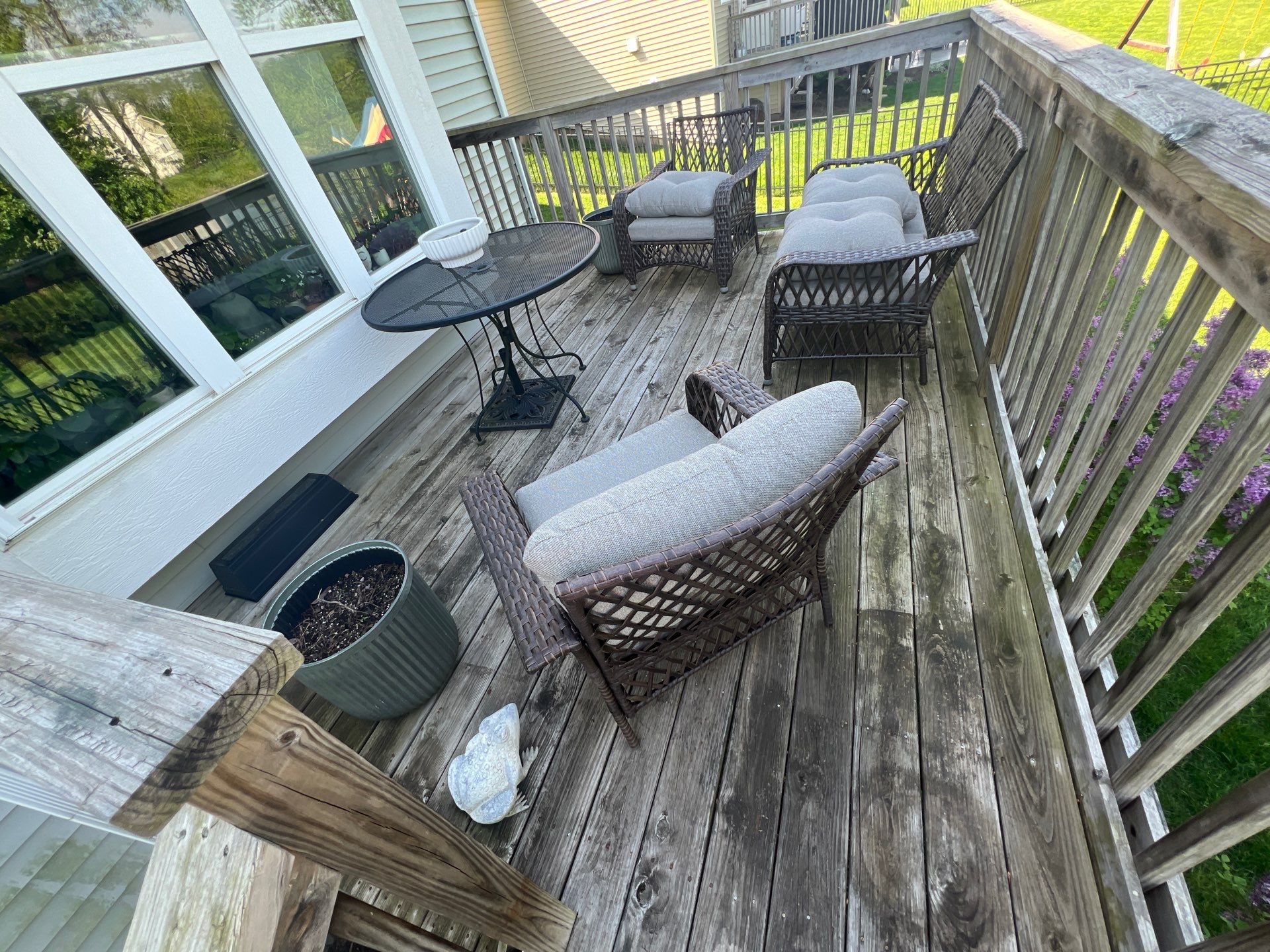 wood deck cleaning and staining by Northern Power Washing LLC.