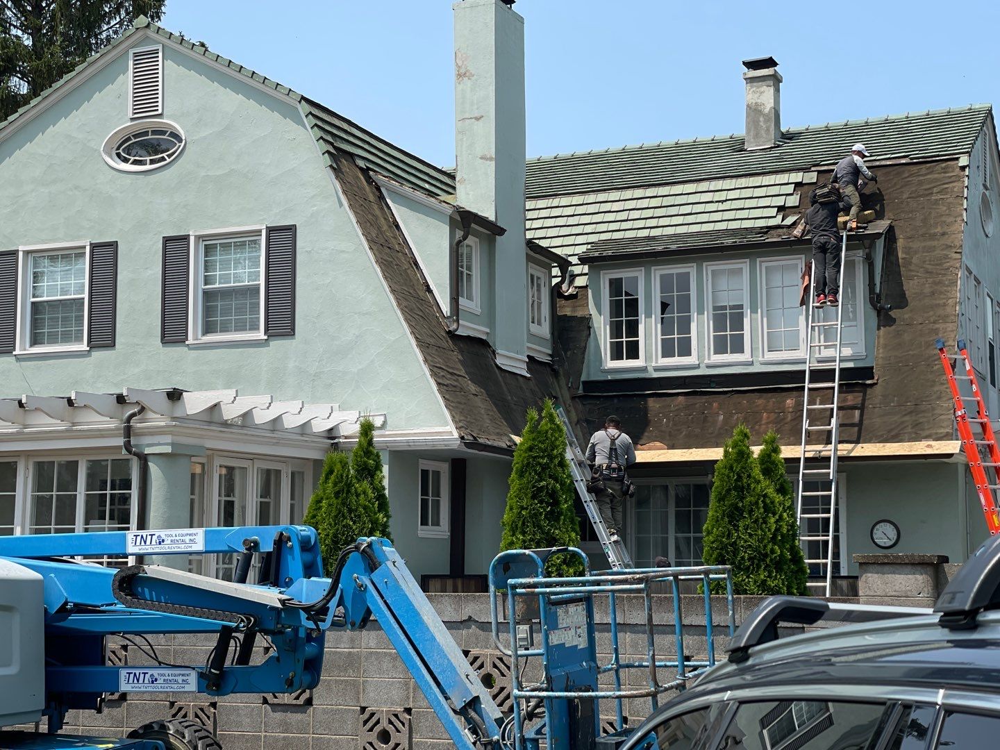 Slate removal/Cedar Shake replacement by Storm Contracting 