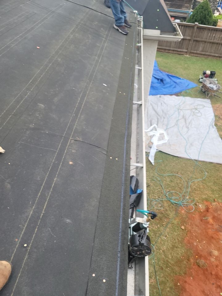 Residential Roofing Installation using Roof Replacement by American Roofing & Construction LLC