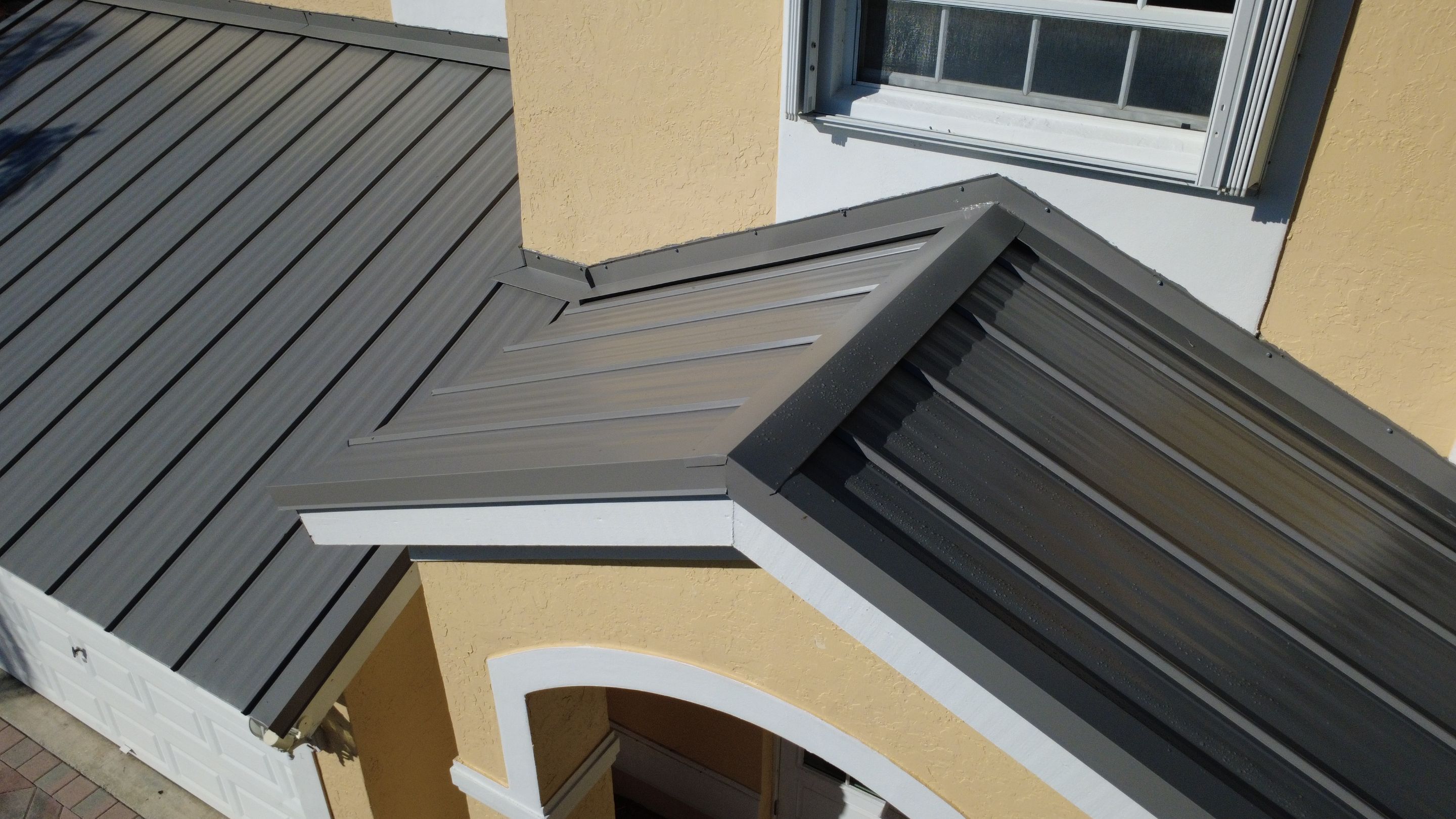 Residential Roofing Installation using 1" Nail strip metal roof by BLUES BROTHERS ROOFING