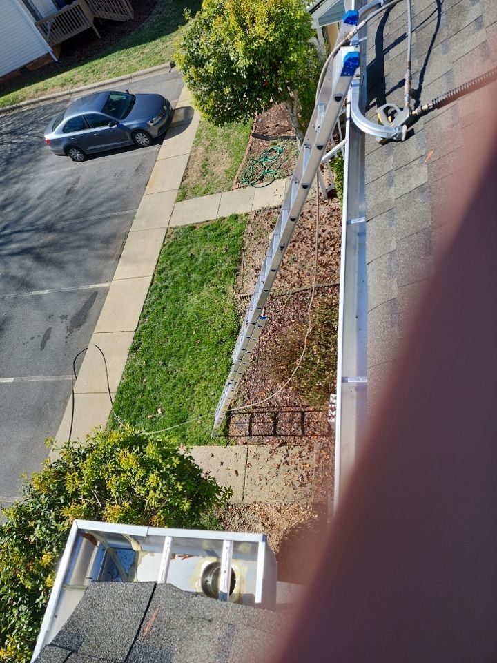 Gutter Cleaning using water by Power Wash Masters LLC