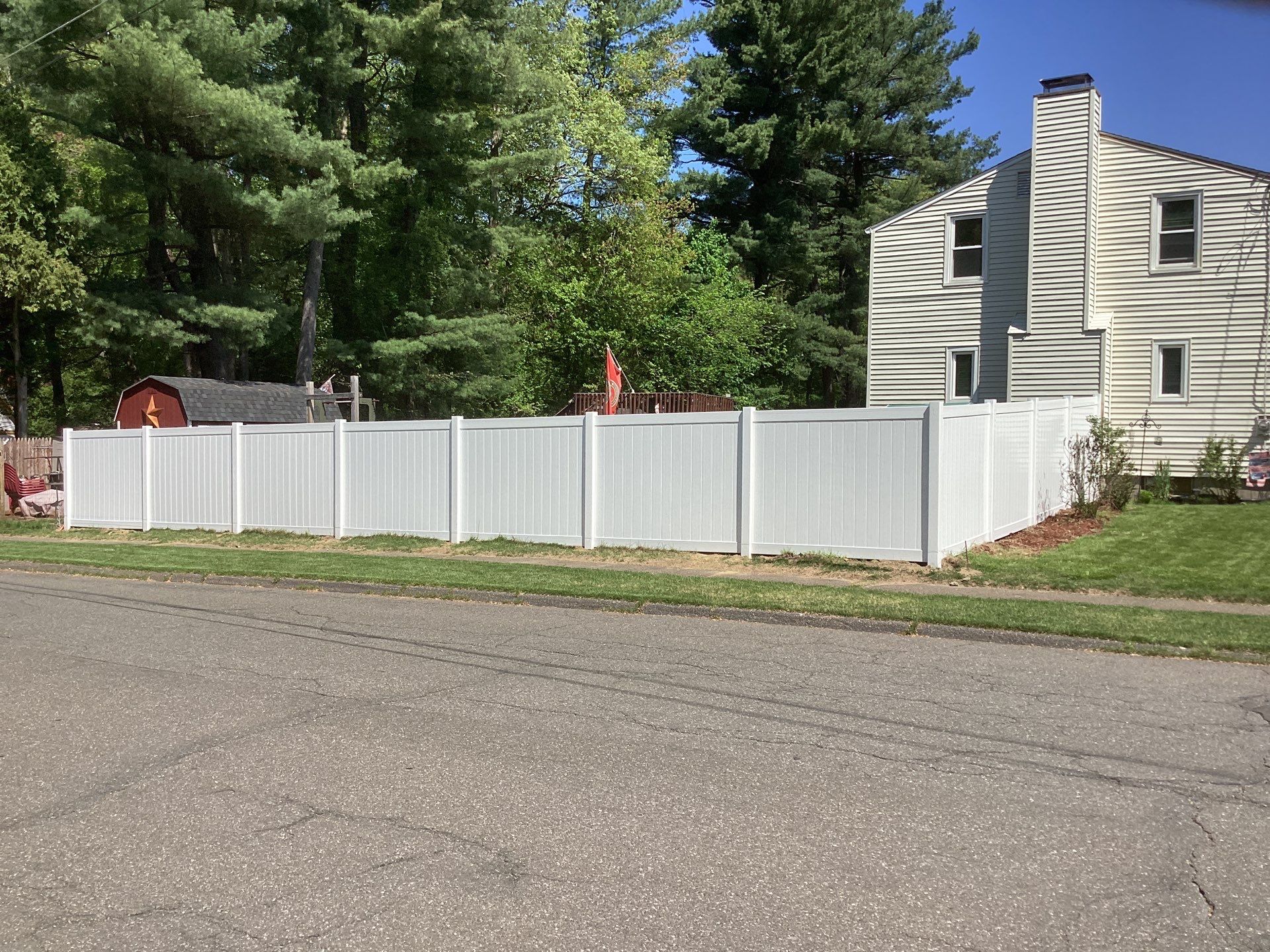 Replacement fence with White Vinyl Privacy and matching gates.  by DiGiorgi Roofing and Siding Inc