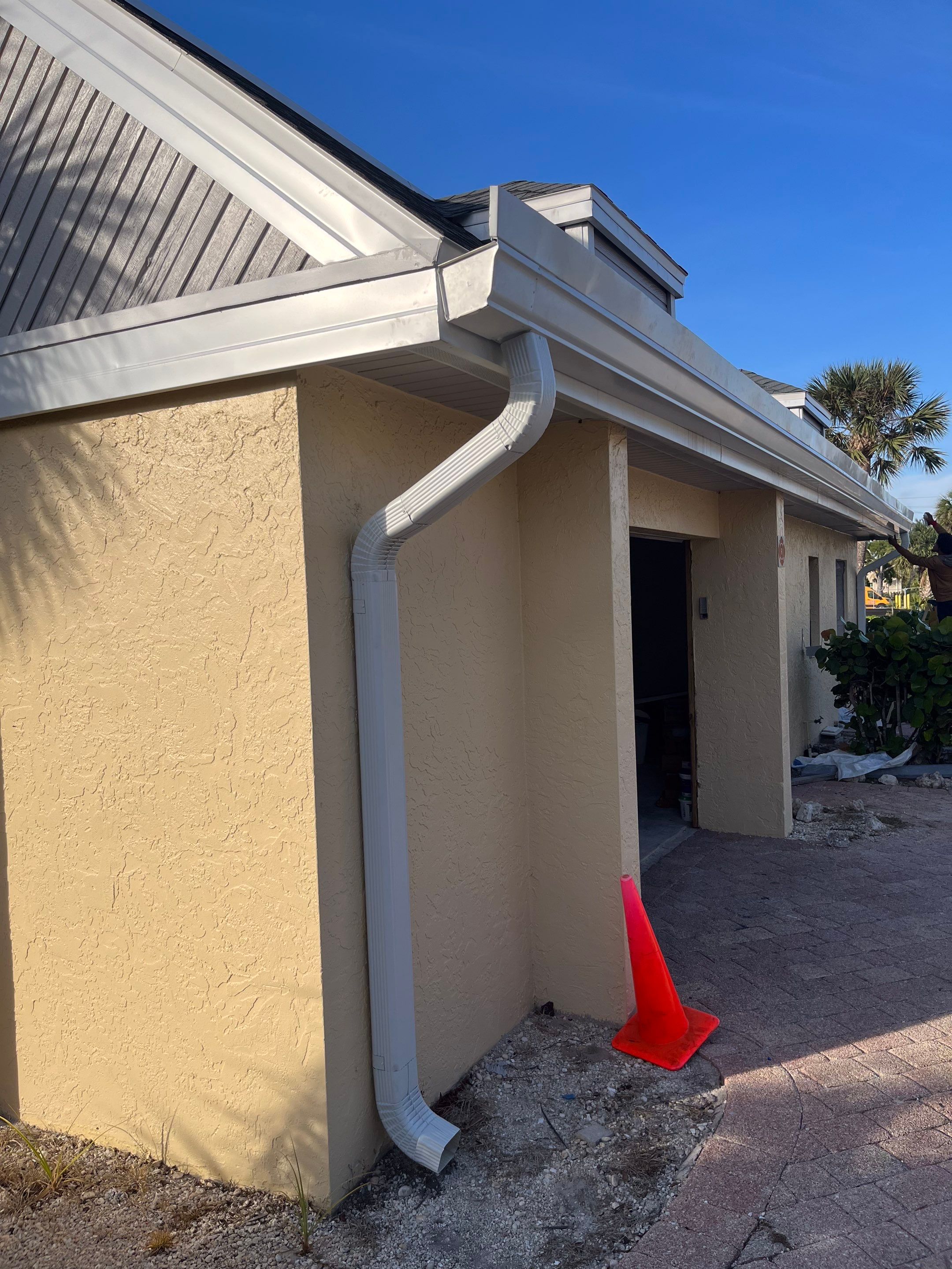 K-Style Seamless Gutter Installation using White Seamless Gutters in Sanibel FL by Gutter Professors