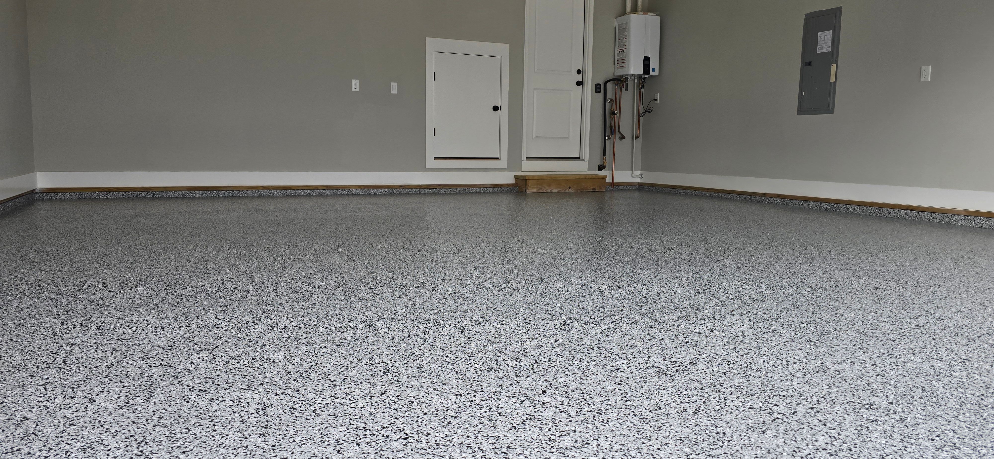 Garage using Houndstooth by Elite Floor Solutions