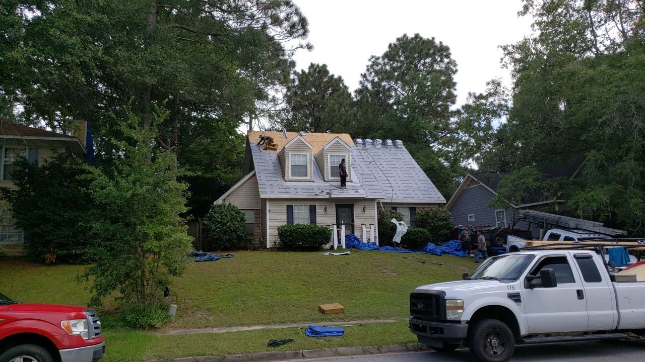Residential Roofing Installation using Roof Replacement by American Roofing & Construction LLC