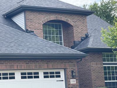 Full replacement - insurance paid. Big brick flashing work