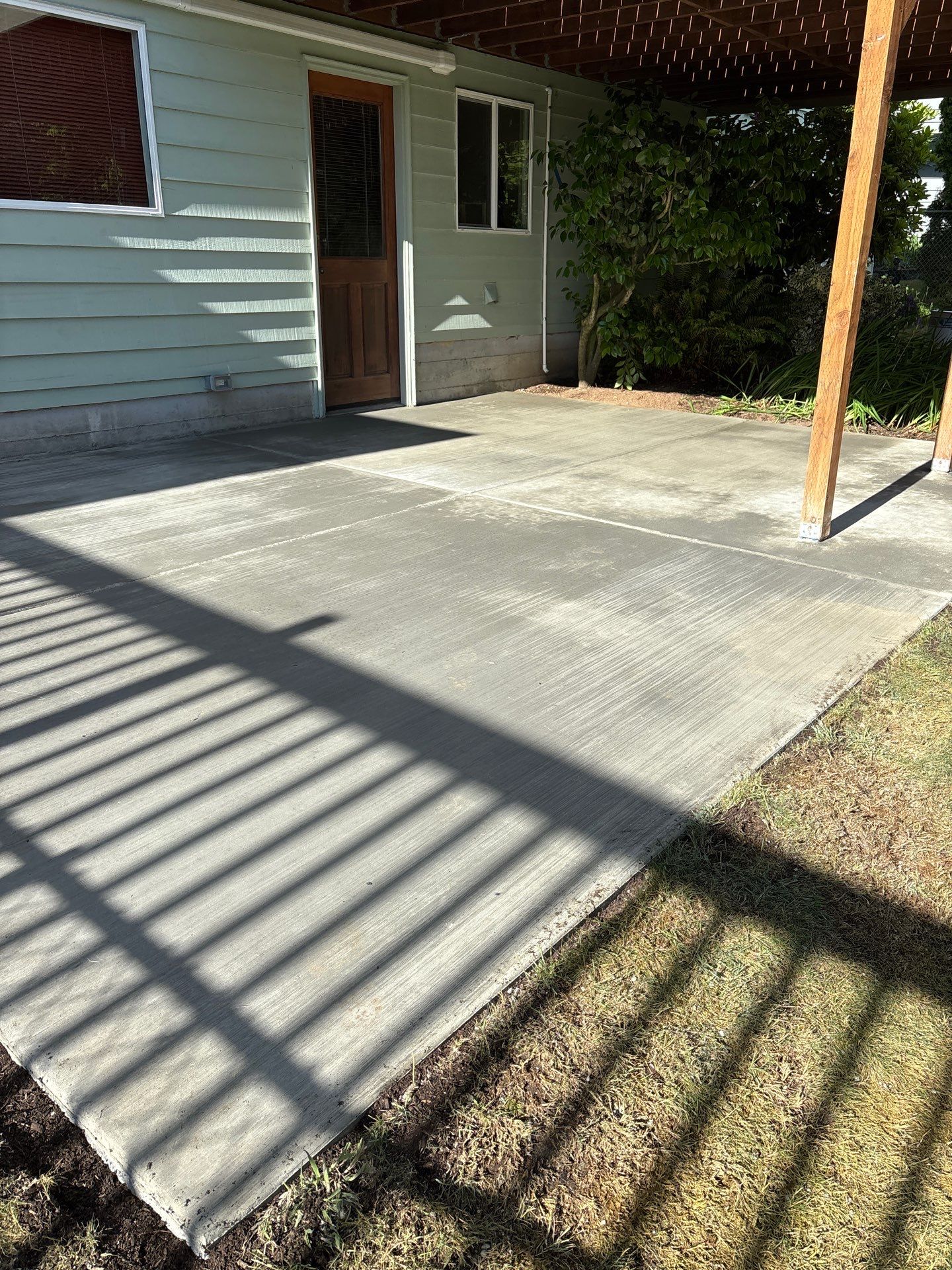 Concrete Patio & Driveway Renovation with Retaining Wall | Seattle  by Jireh Asphalt & Concrete Inc 
