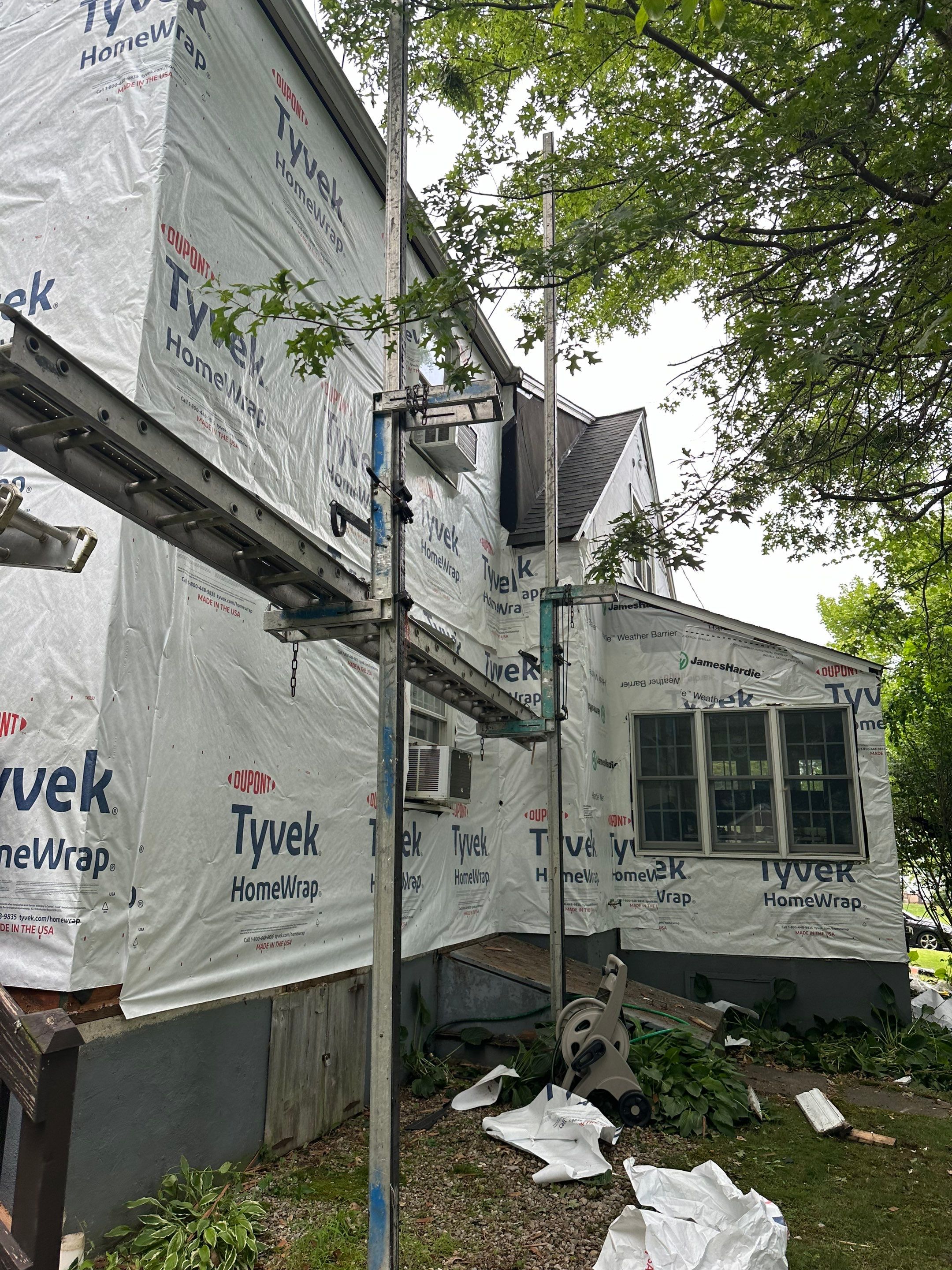 Complete Exterior Estate gray with Pacific Blue Siding by A Plus Exterior