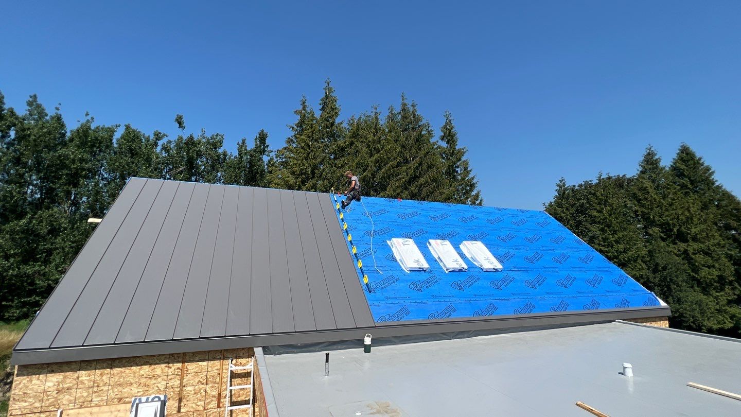 Residential Roofing Installation using multiple products by Top Notch Roofing Inc