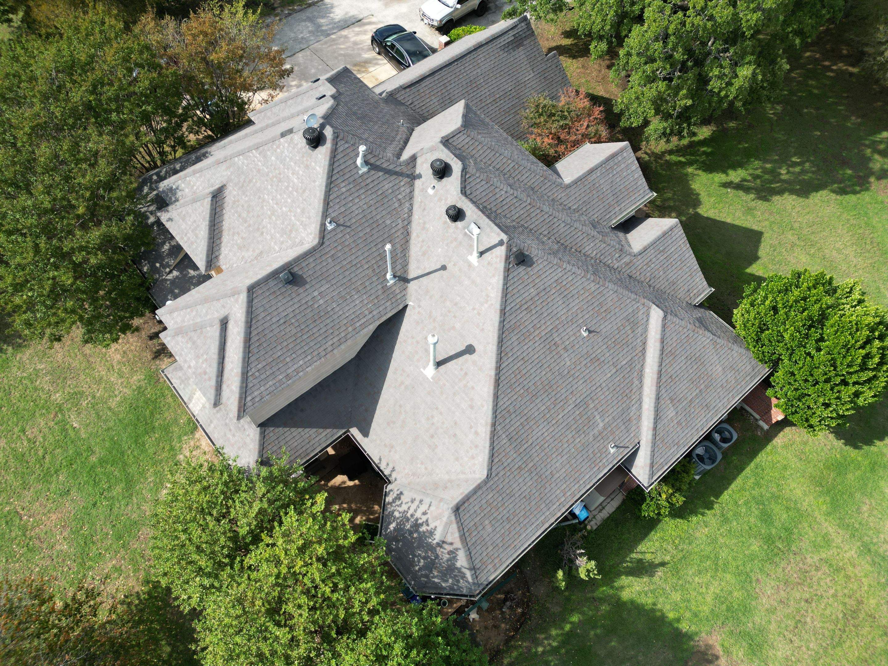 Residential Roofing Installation using ATLAS Pinnacle Pristine Shingles by Harvey Roofing & Construction