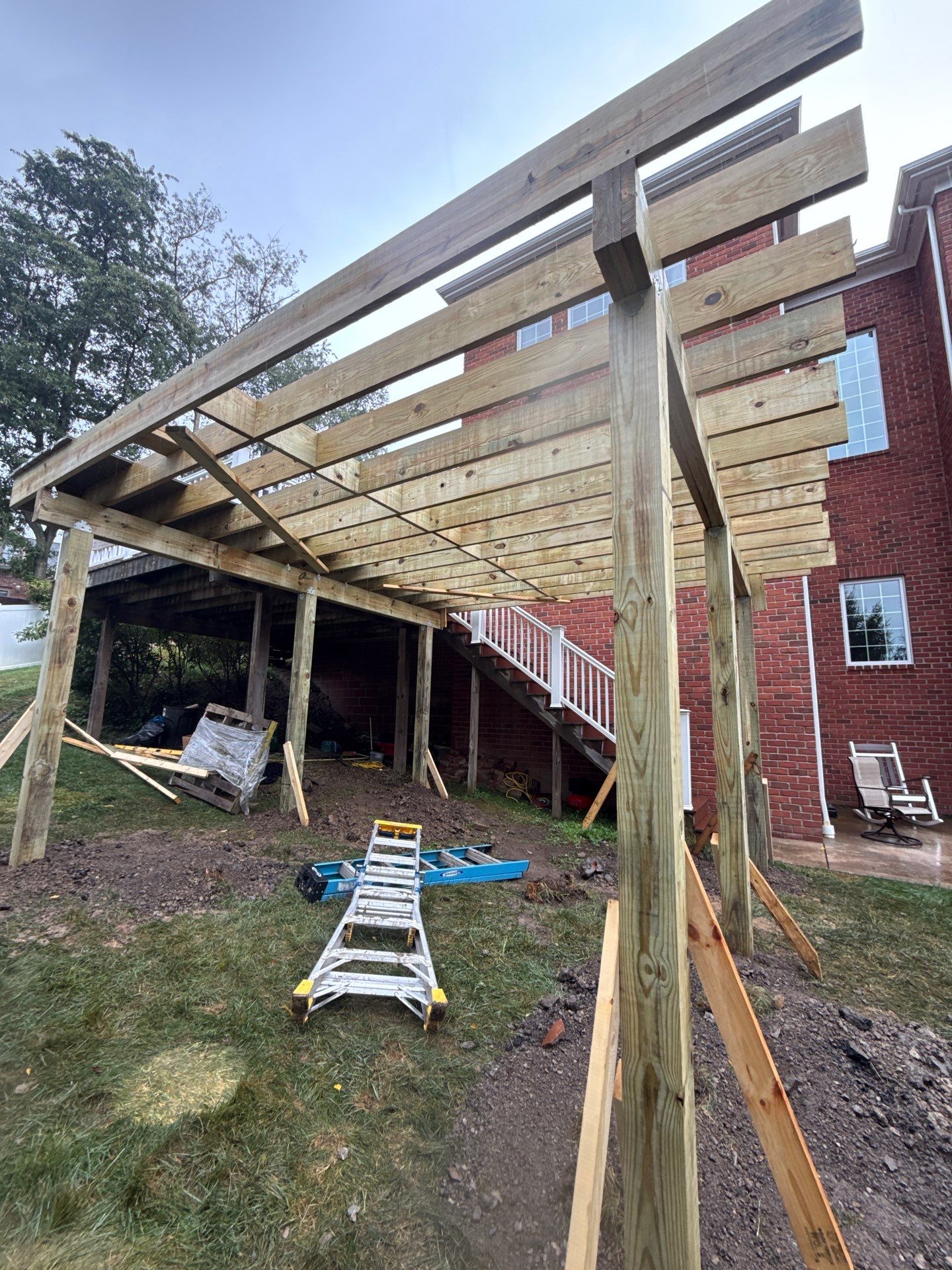 Deck extension  by Cousins Roofing Siding & Decks