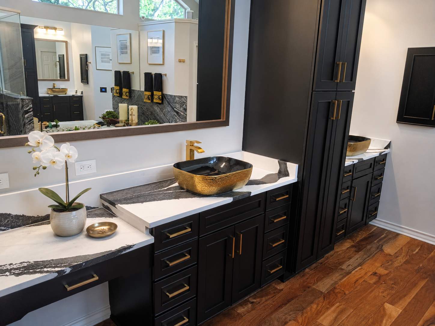 Bookmatched Natural Stone Shower by Legacy Bath and Kitchen 