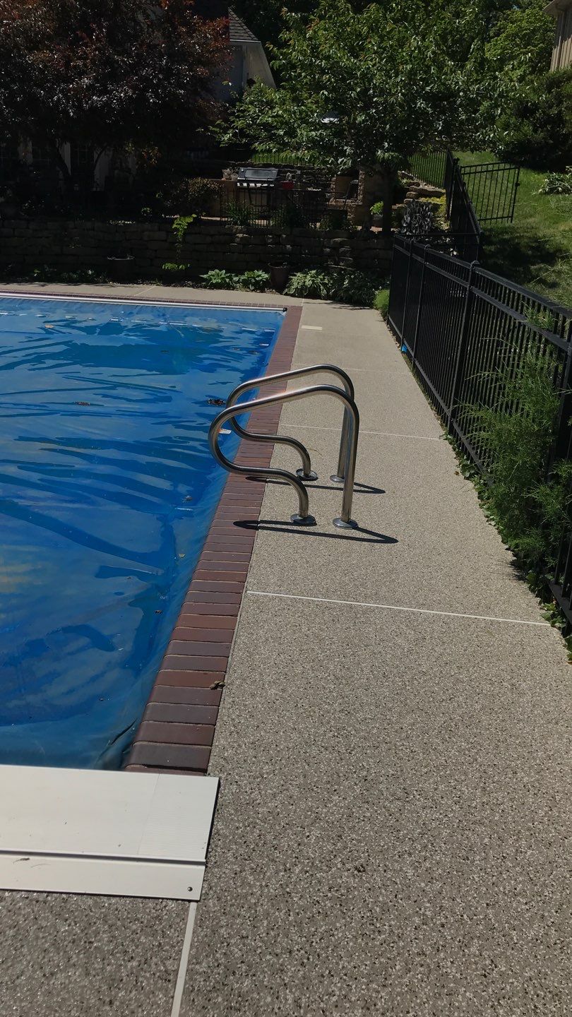 Pool Deck using Pebble Beach by Select Painting, Coatings & Garage Cabinets