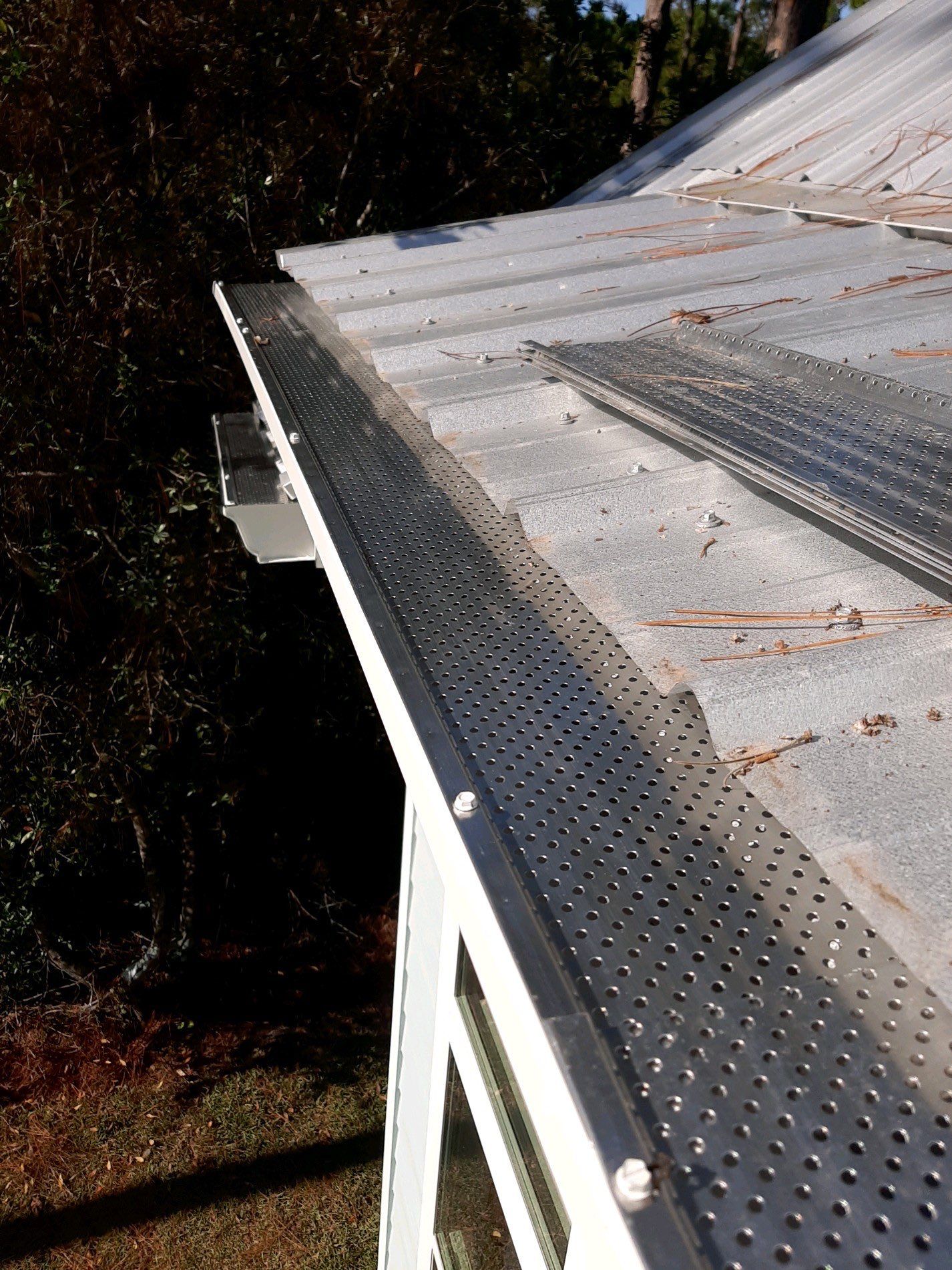 Gutter Installation using K-Style Seamless Gutters and Gutter Guards by Gutter Professors