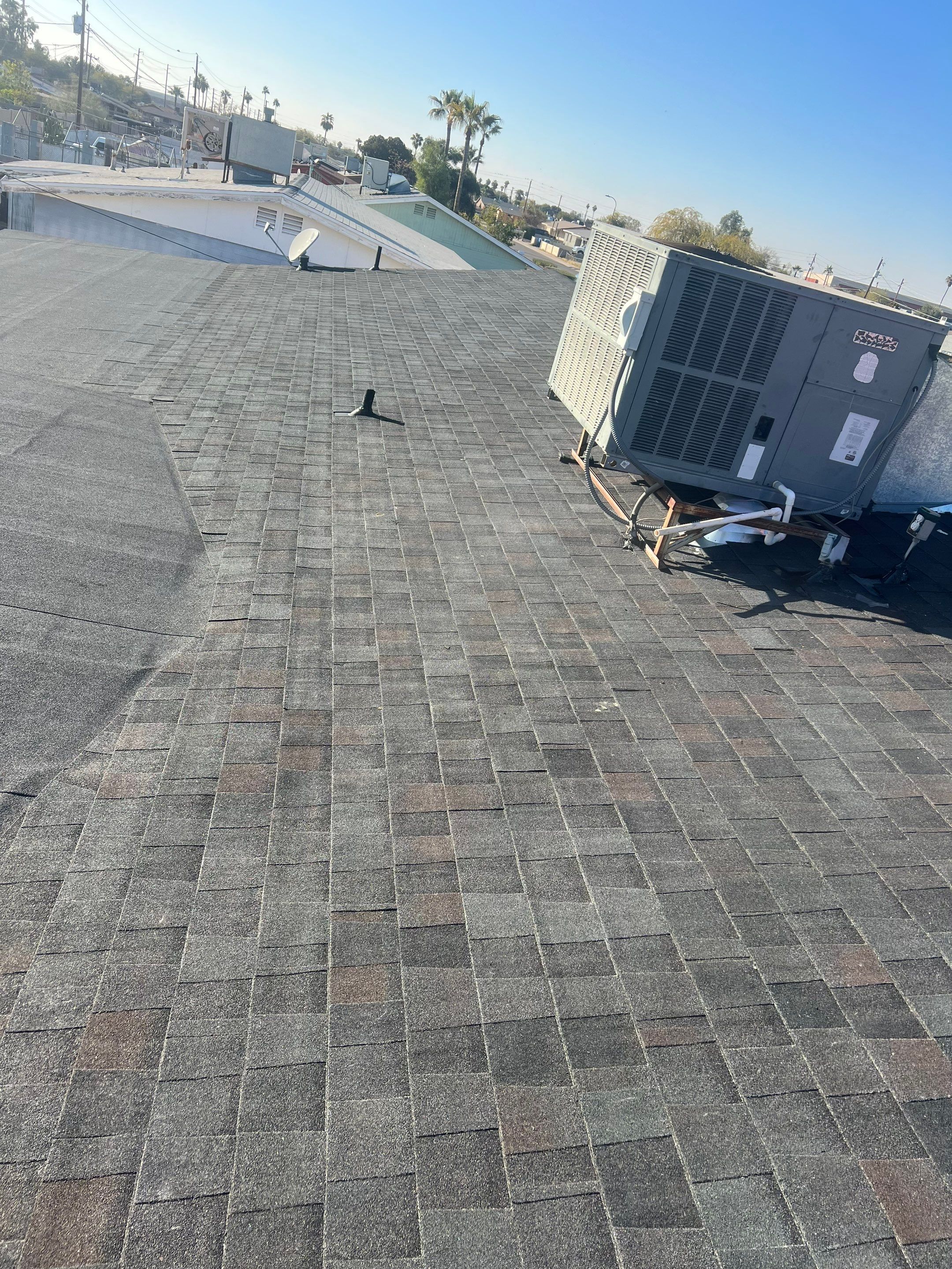 Kim & Chien's Full Re-Roof by All Storm Roofing & Construction
