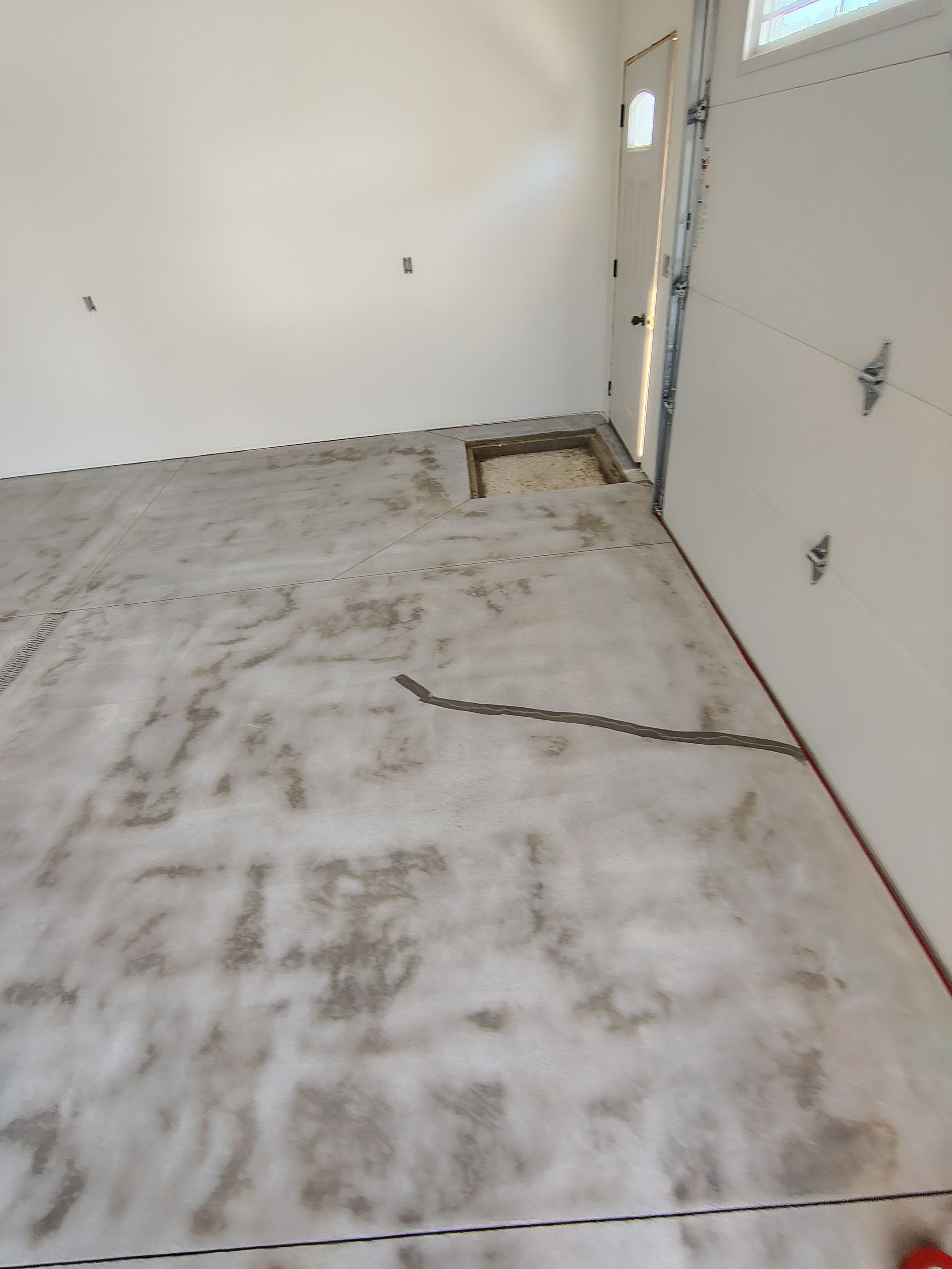 Custom Garage and Basement Epoxy Floor Coating in Menno by Select Painting, Coatings & Garage Cabinets