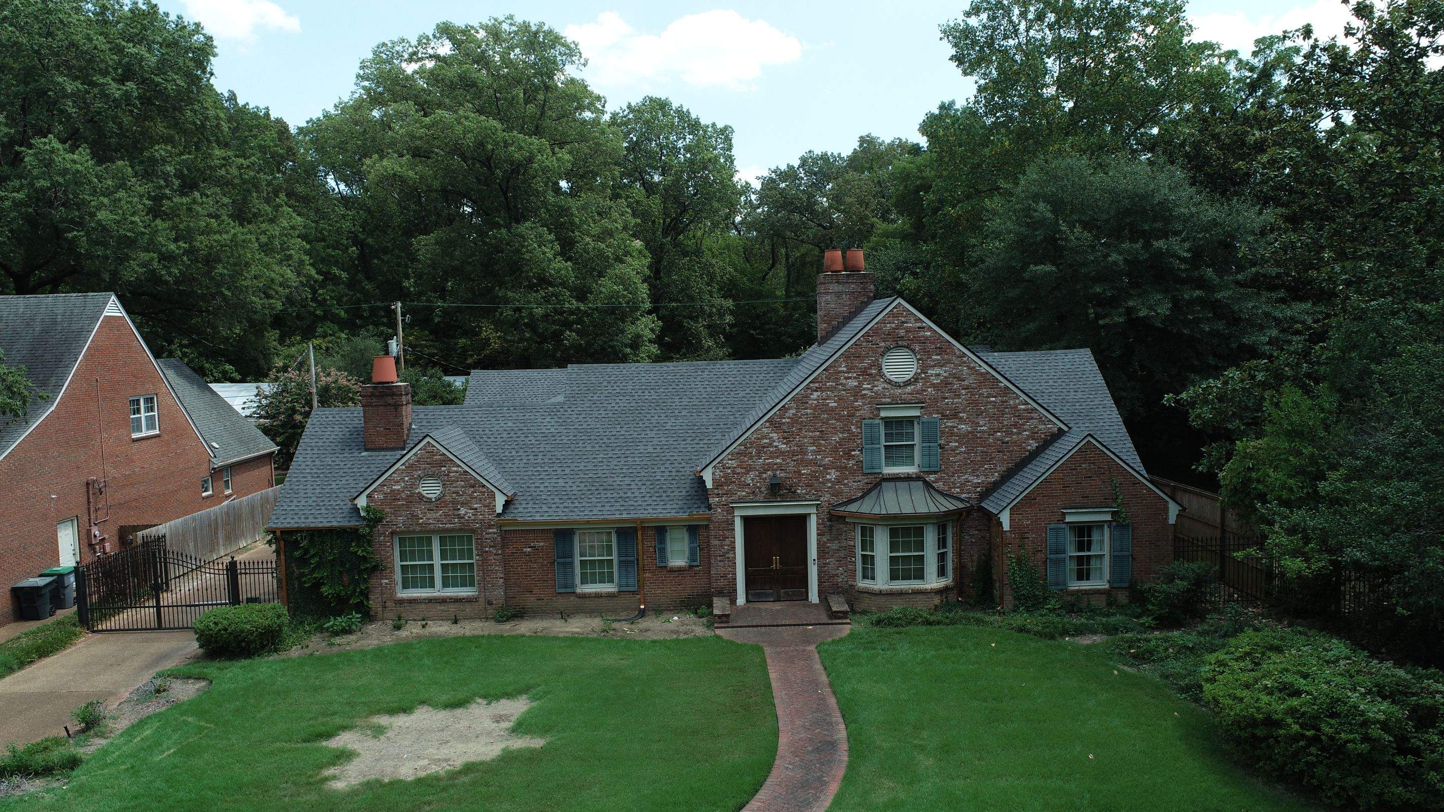 Full Roof Replacement with gutter upgrade after tree impact damage in East Memphis by Revival Roofing Services