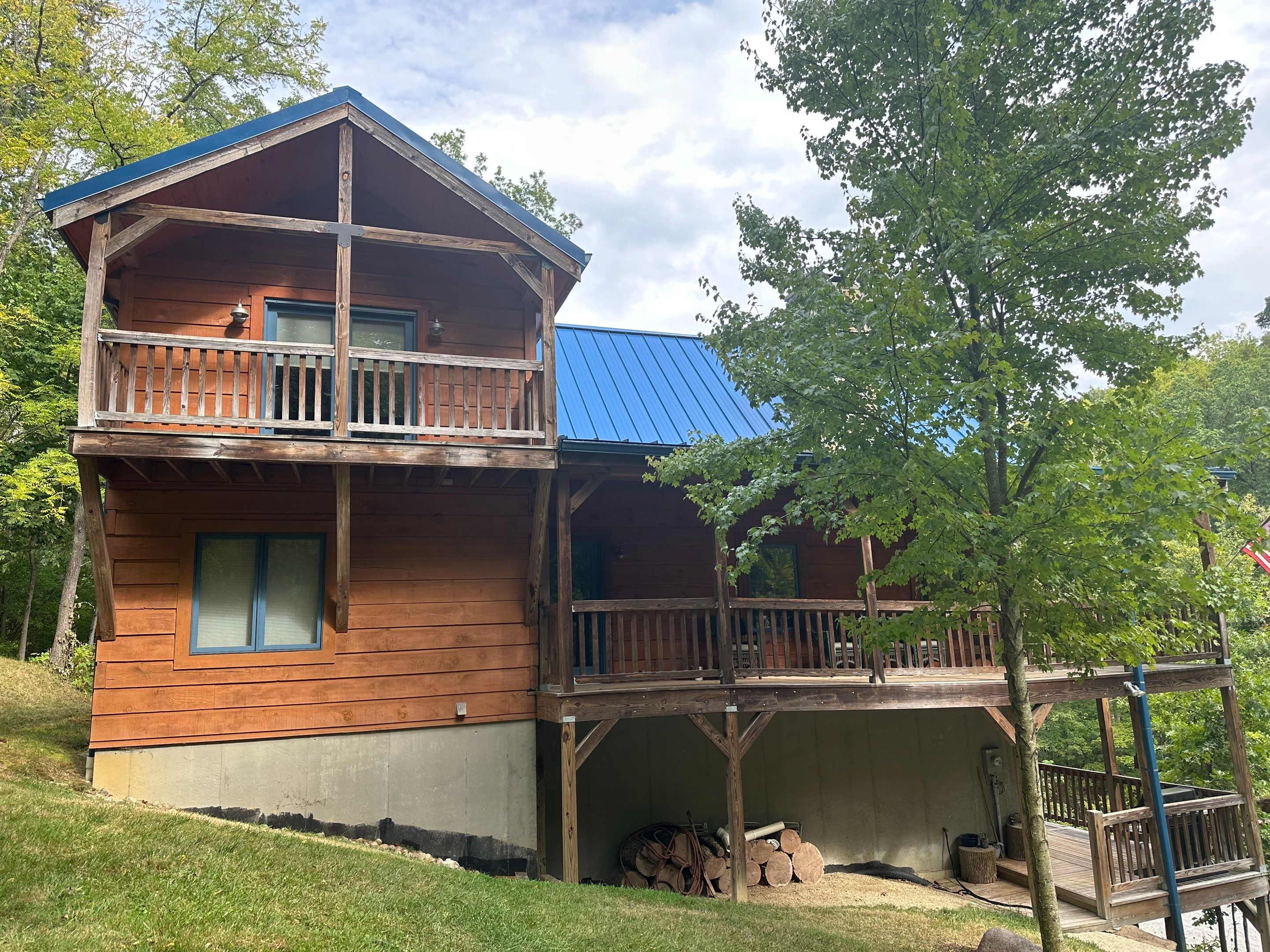 Residential Roofing Installation using Standing Seam Metal - Gallery Blue by RoofX 