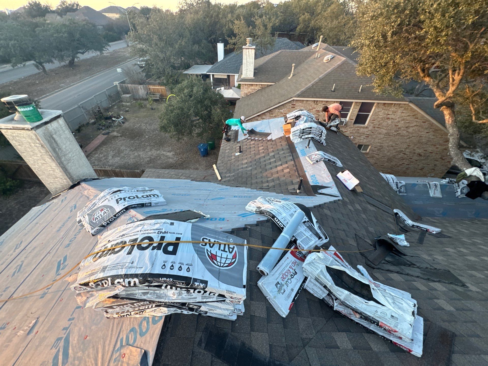 Residential Roof Replacement using ATLAS PROLAM WEATHER WOOD by Elite Roofing LLC