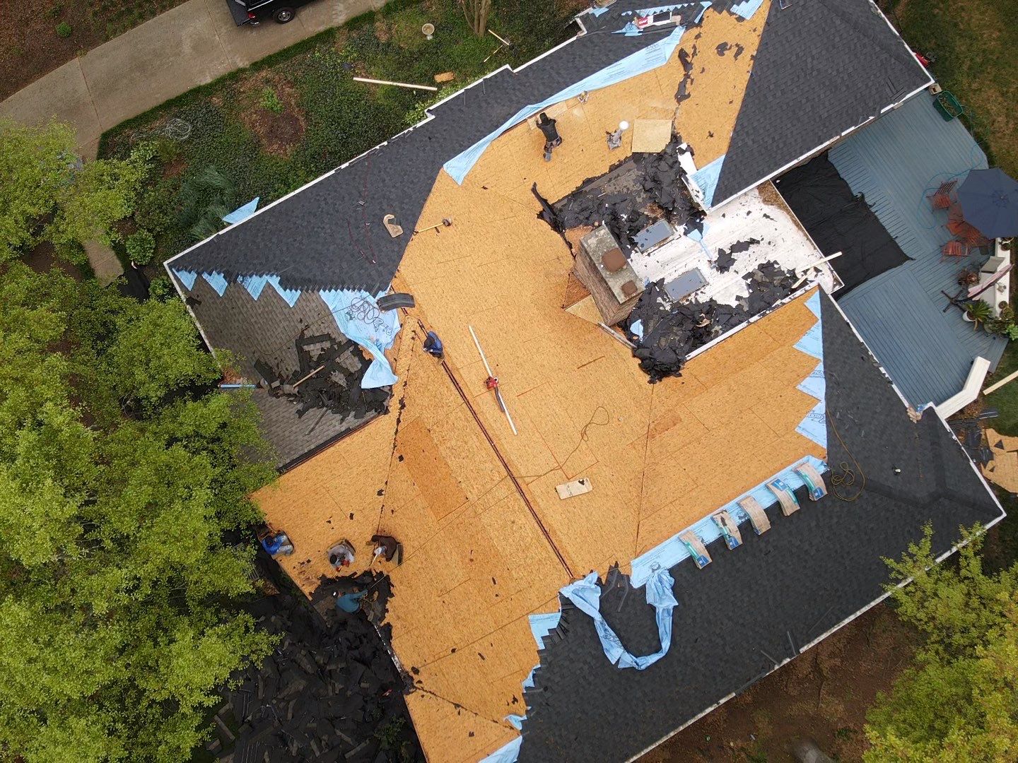 Spartanburg Residential Roof Replacement with Architectural Shingles and Skylights by Roofers LLC