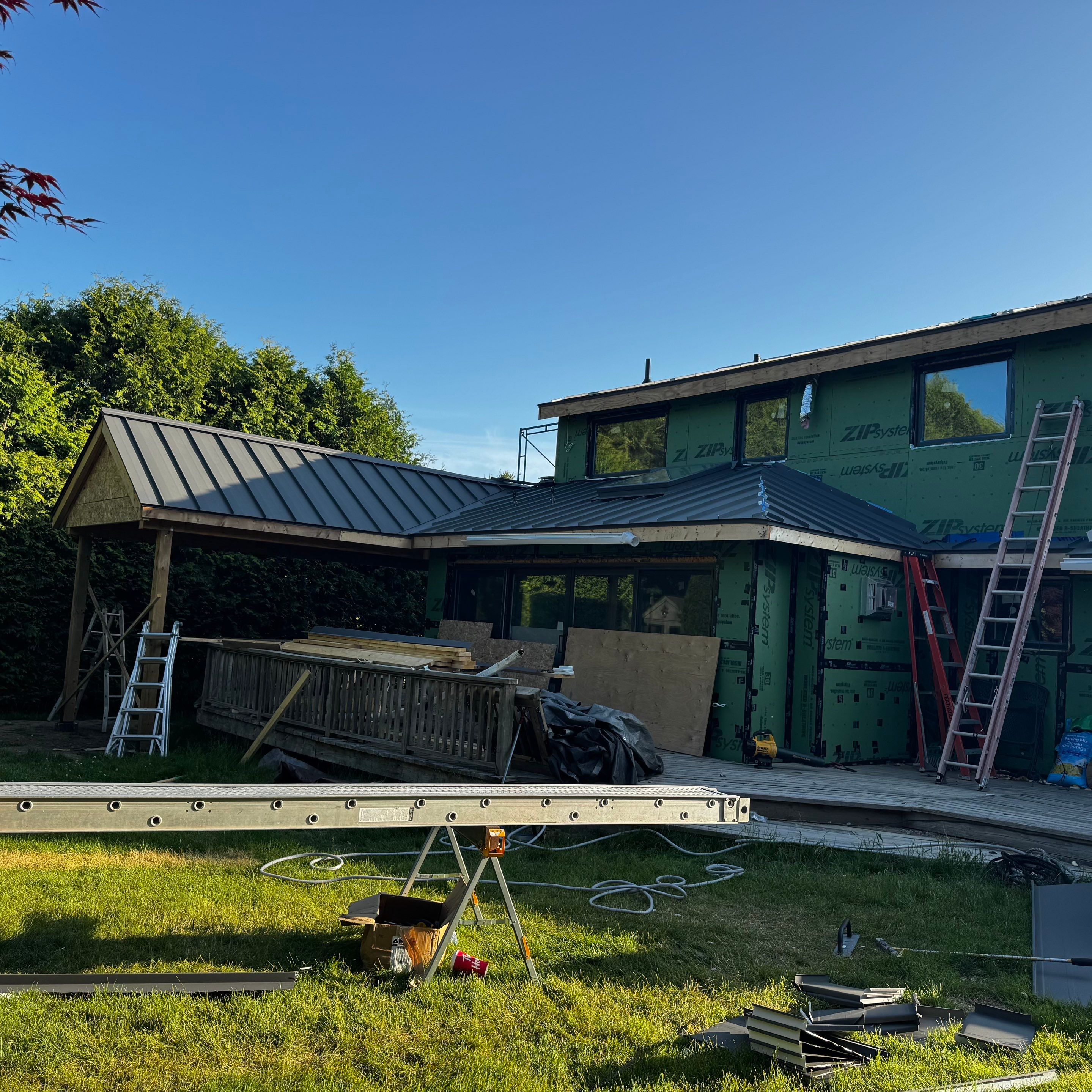 Residential Roofing Installation using 16" Standing Seam Panels by Jay Carter Roofing & Sheet Metal
