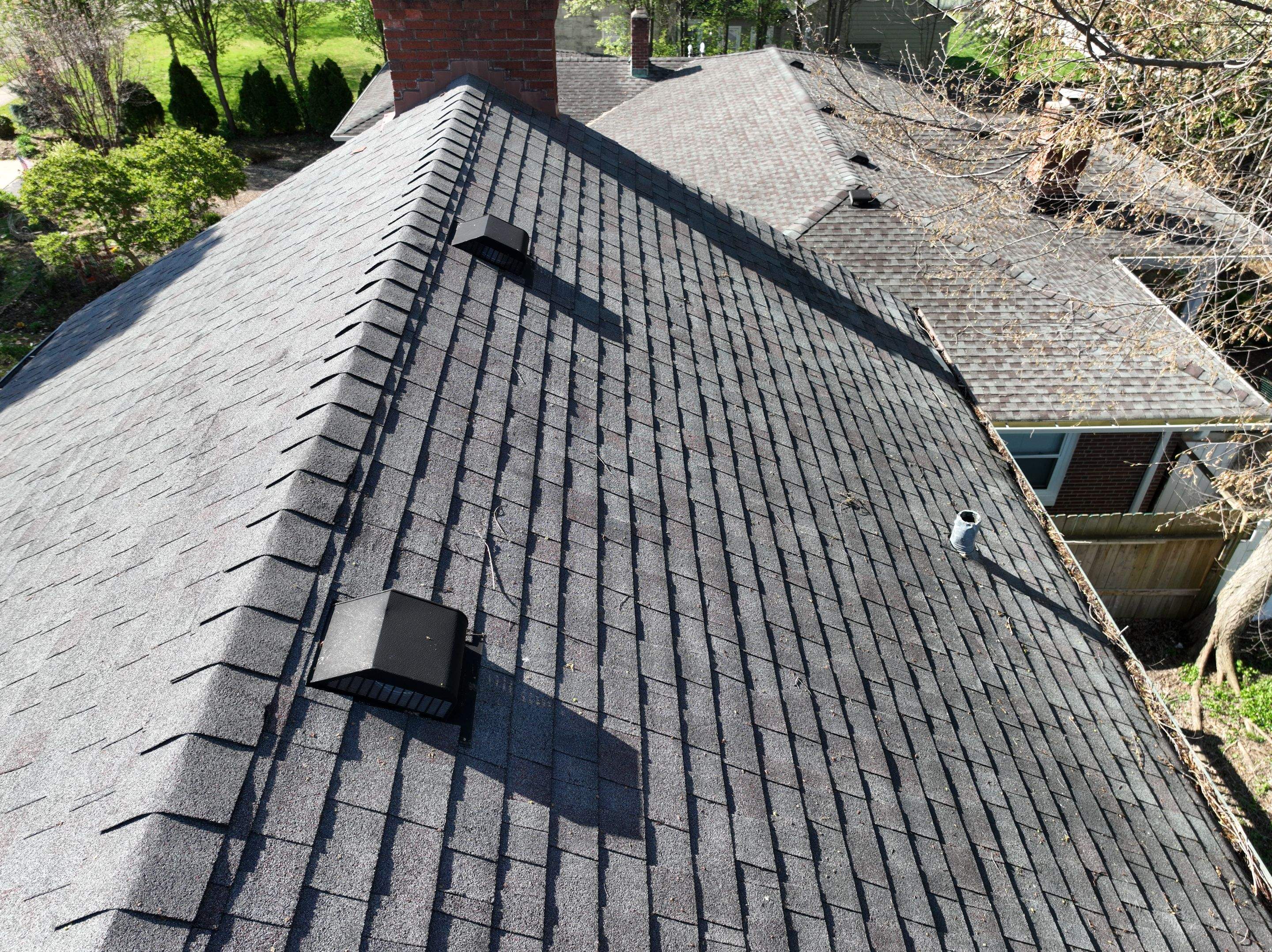 Oakridge Onyx Black and Black Gutters by 317 Roofing & Restorations
