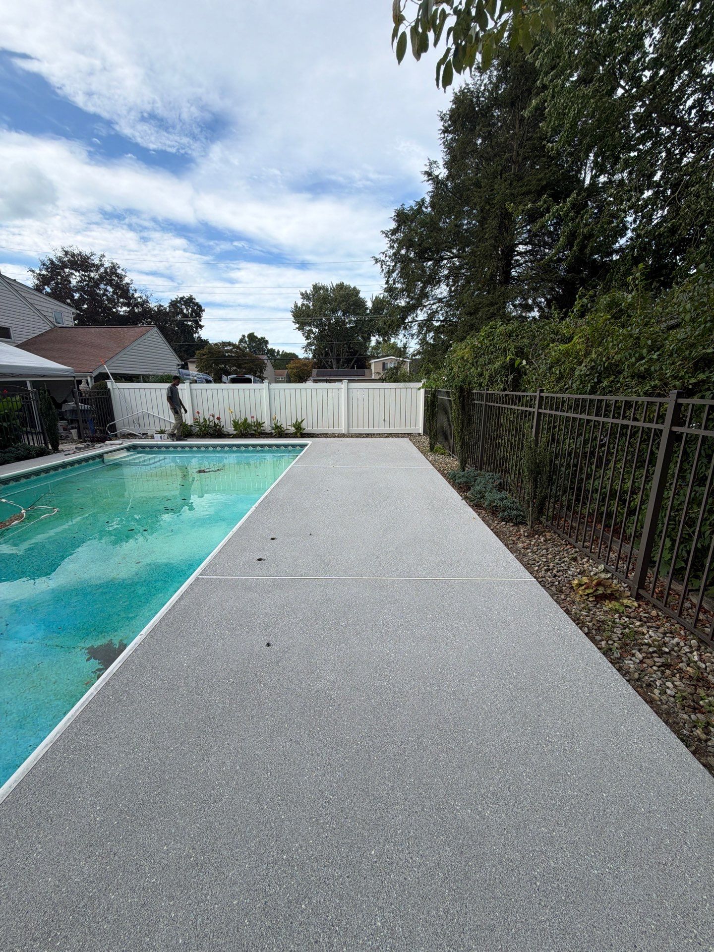 Blue Granite Pool Patio Concrete Coating in Lincoln Park by Spectrum Painting, LLC
