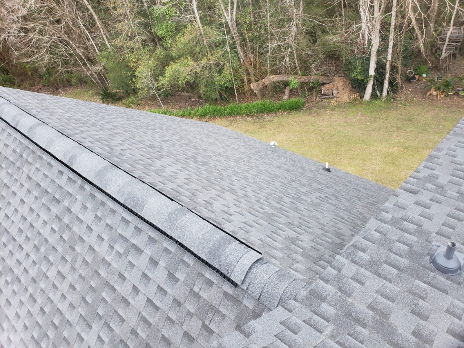Residential Roofing Installation using Roof Replacement by American Roofing & Construction LLC