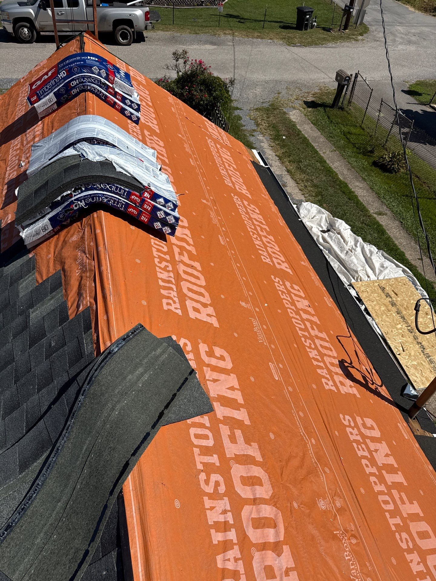 Residential Roofing Installation using GAF Timberline HDZ Charcoal by Rainstoppers Roofing