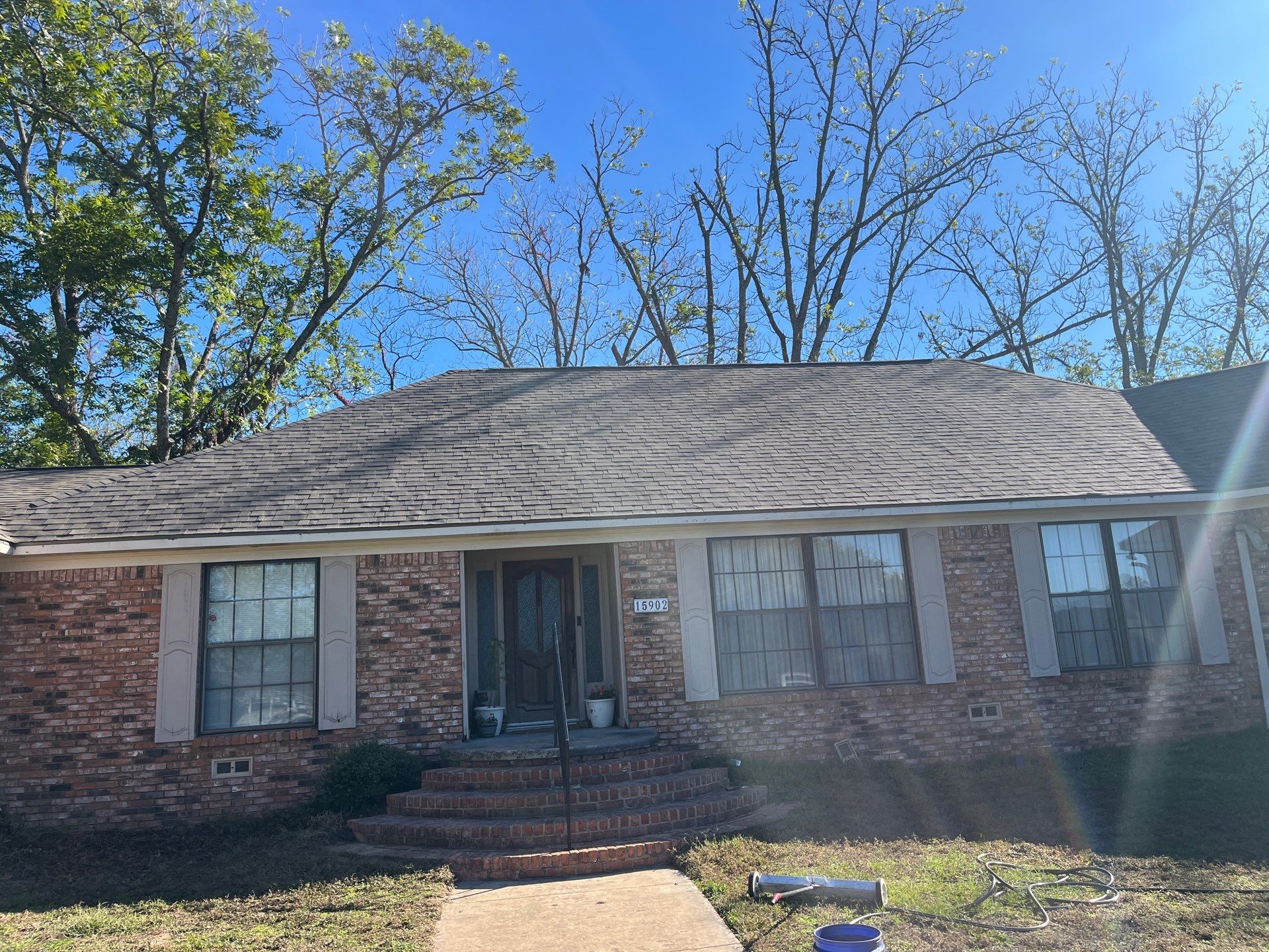 Malarkey WWP-Reddish Brown Brick  by Tejas Roofworks + Restoration
