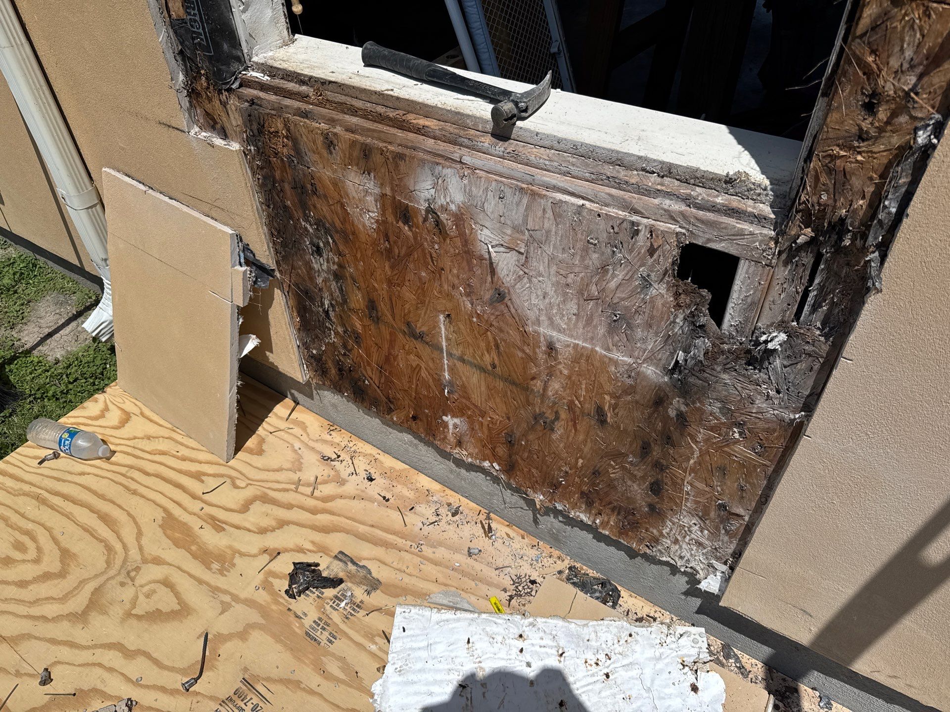 Installing Windows on a Submarine  by Bayfront Roofing and Construction
