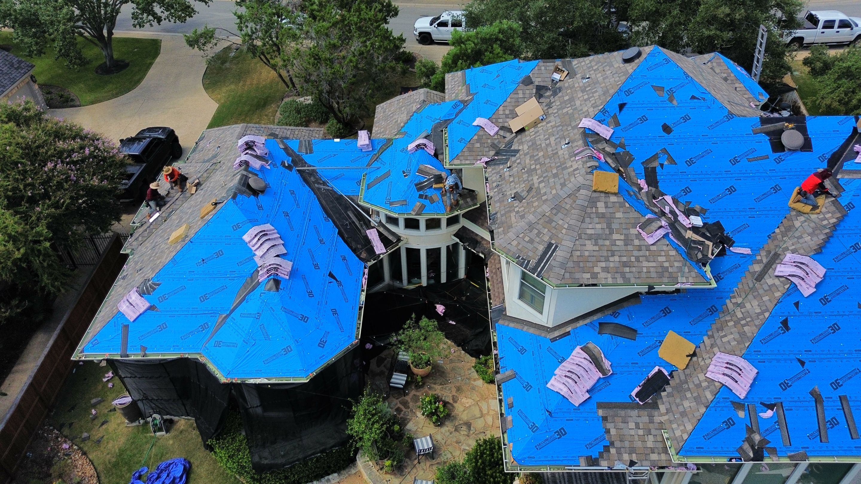 Residential Roof Replacement using 30 Year Laminate Shingles with High Profile Ridge by Premier Roofing and Contracting