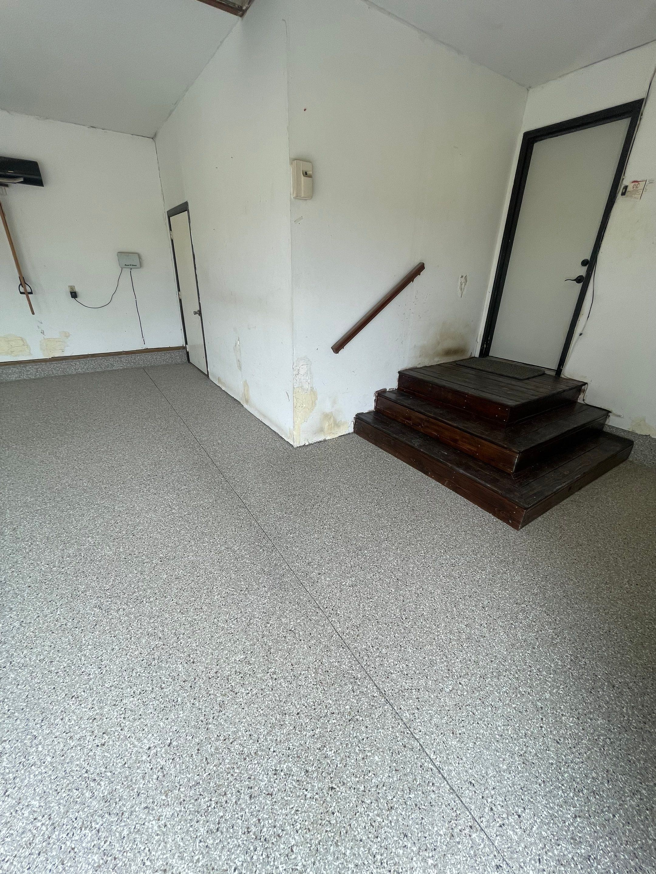 Hartford Residential Garage Floor Transformation With Decorative Chip Coating by Select Painting, Coatings & Garage Cabinets