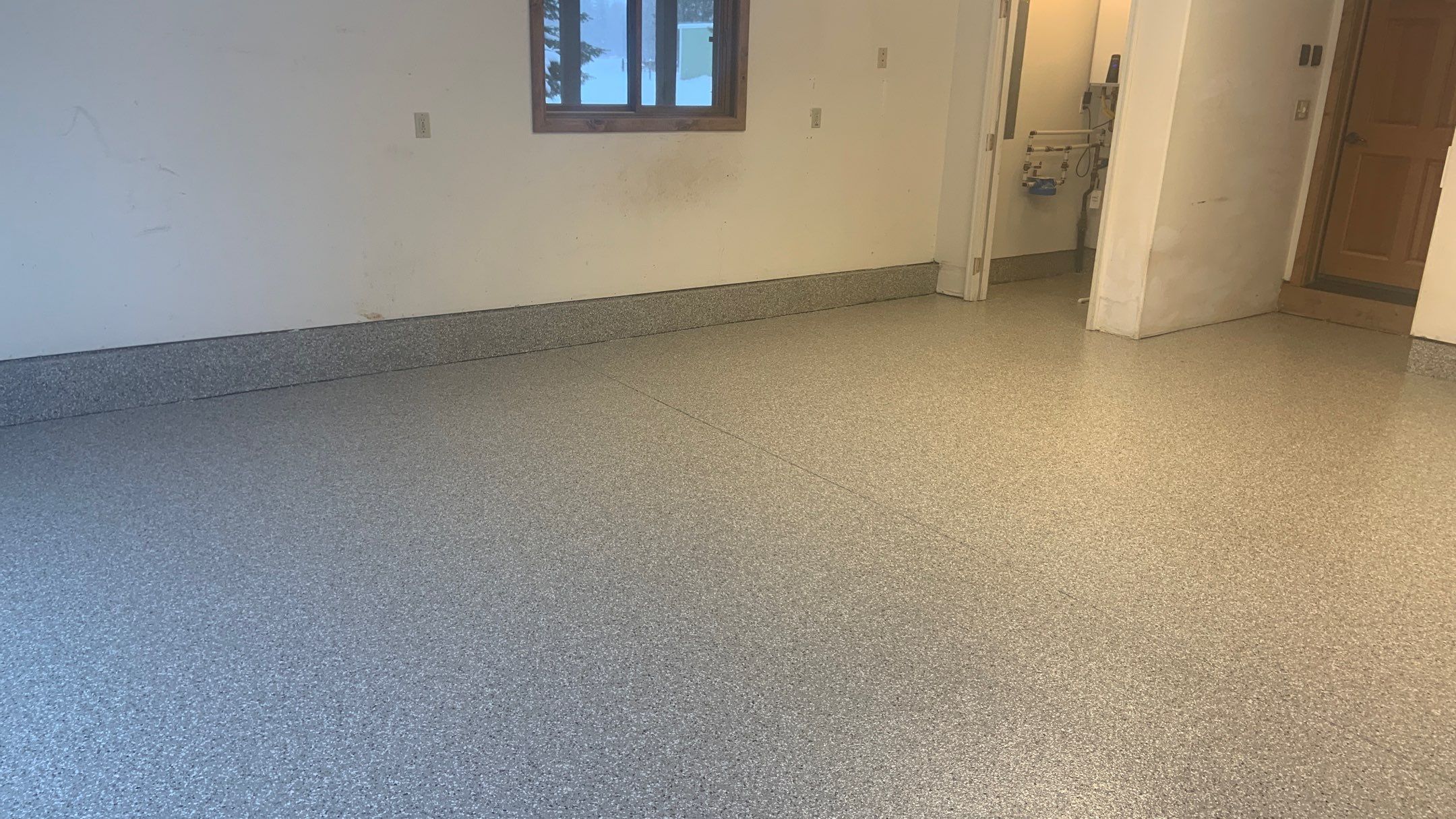 Garage Transformation using Pebble Beach by Croc Coatings, LLC