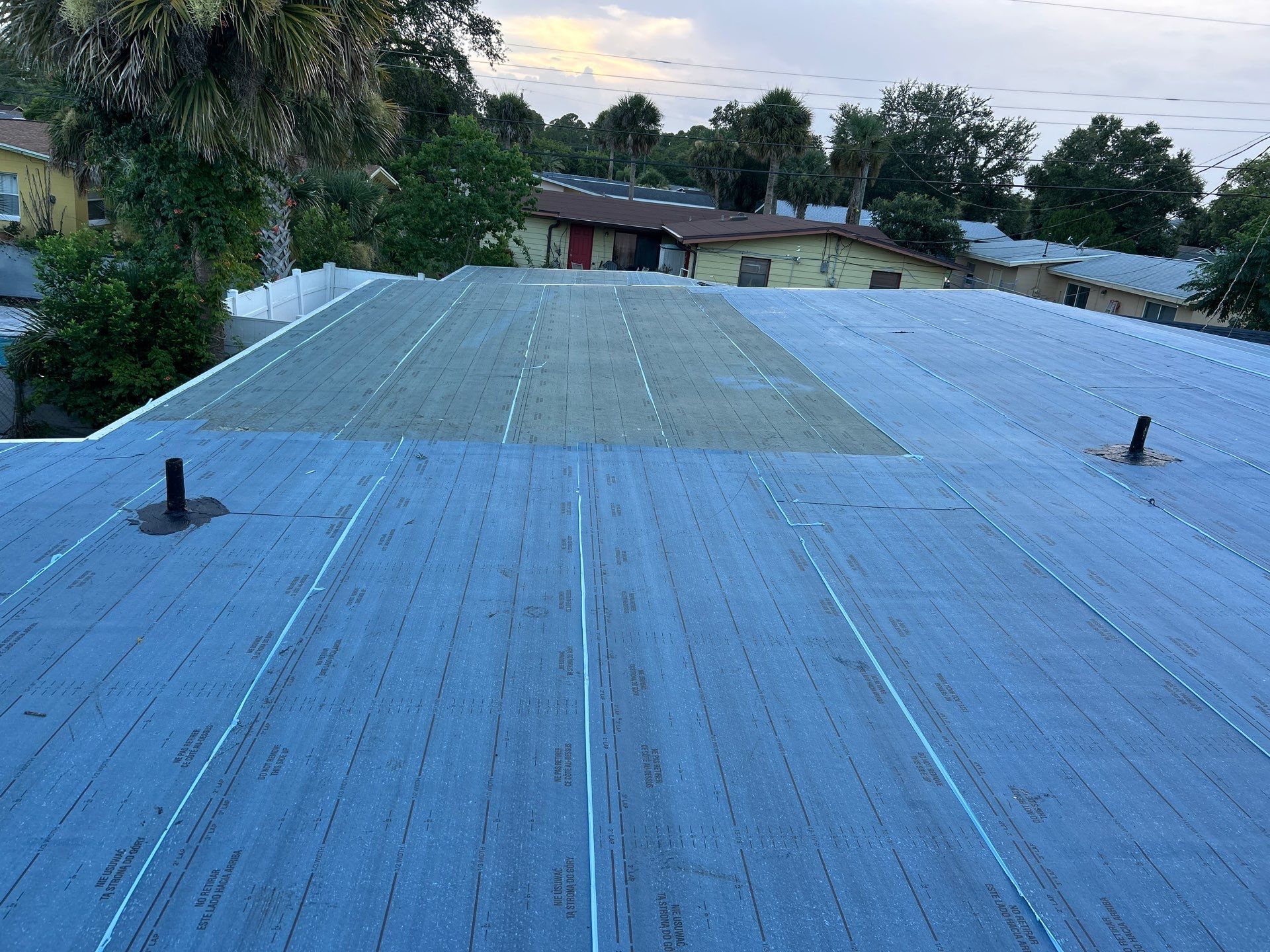 Colonial Slate Modified Bitumen Flat Roof Replacement in Daytona Beach by Pinnacle Roofing Group