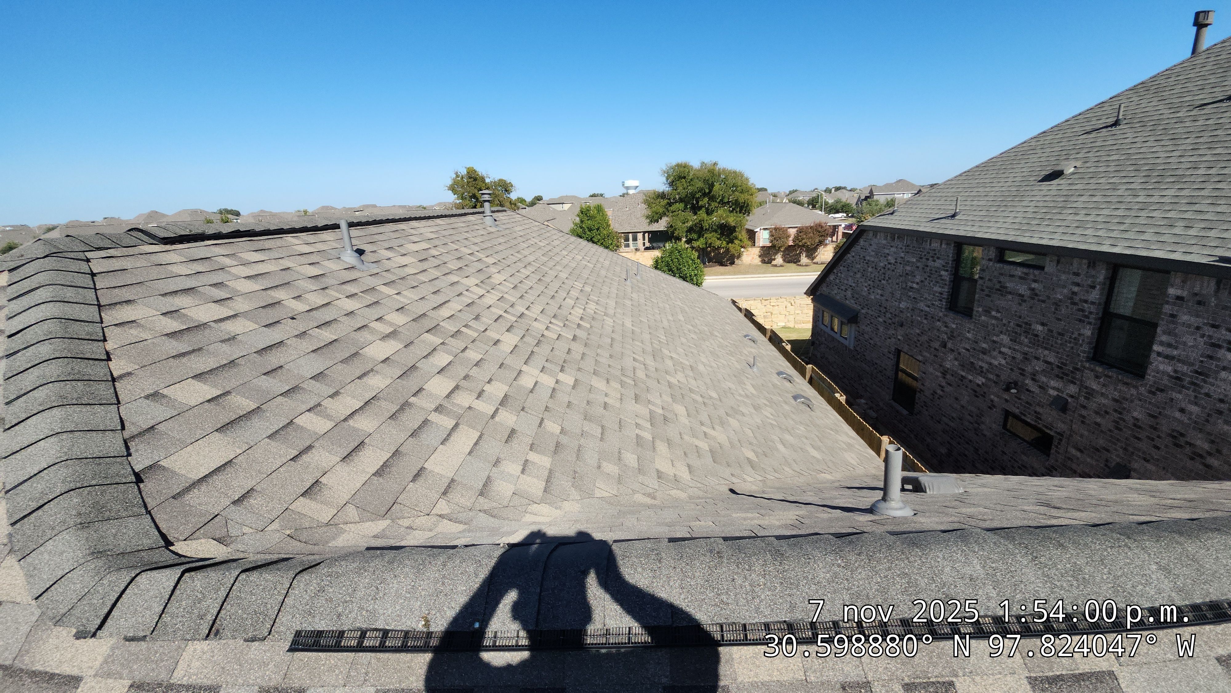 Hail Damage Roof Replacement and Sheathing Repair in Leander by Caliber Restoration LLC