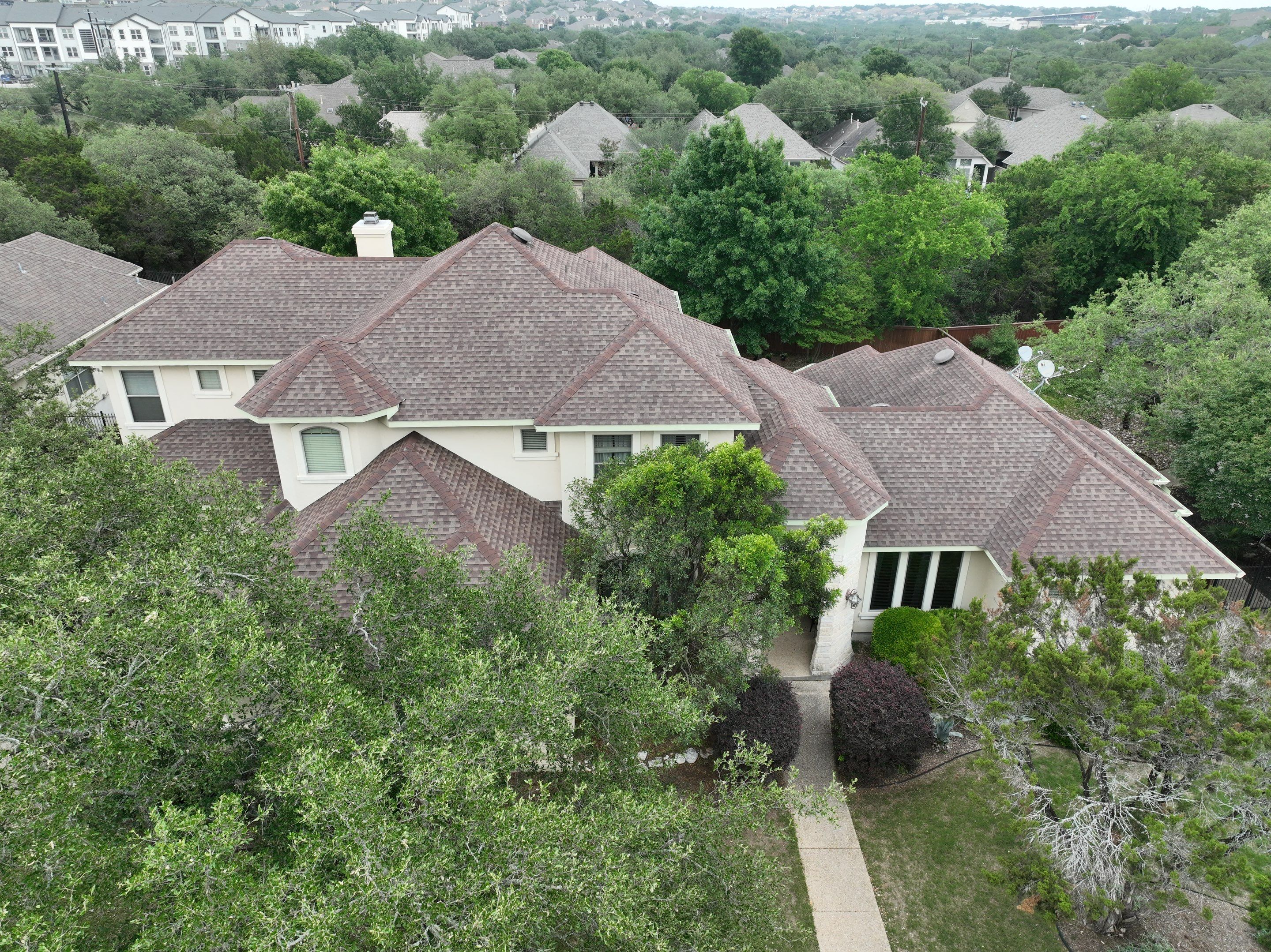 Residential Roof Replacement using 30 Year Laminate Shingles with High Profile Ridge by Premier Roofing and Contracting