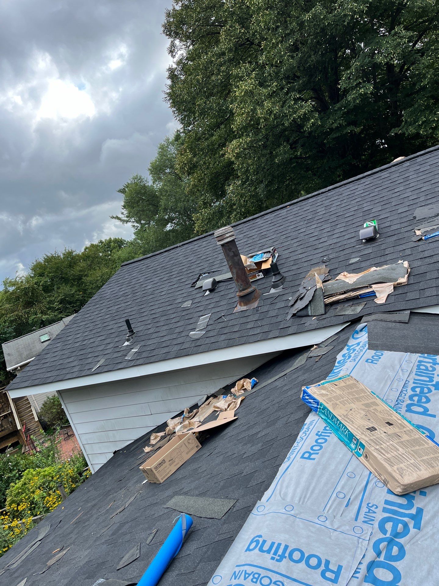 Vienna: Multi-Trade Restoration with CertainTeed Landmark Shingles in Charcoal Black by RM Banning, Inc.