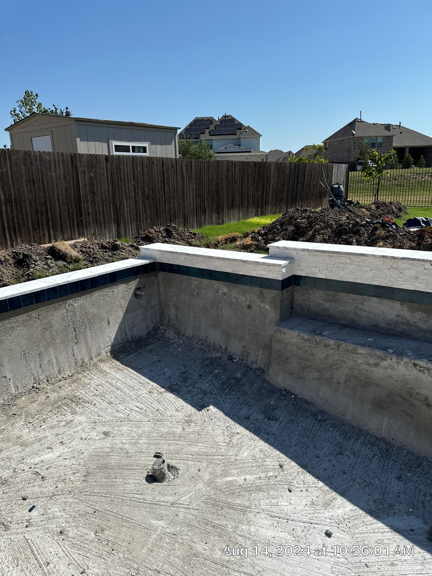 Crisp Geometric Pool with Sun Shelf by Pinnacle Pools and Spas - DFW