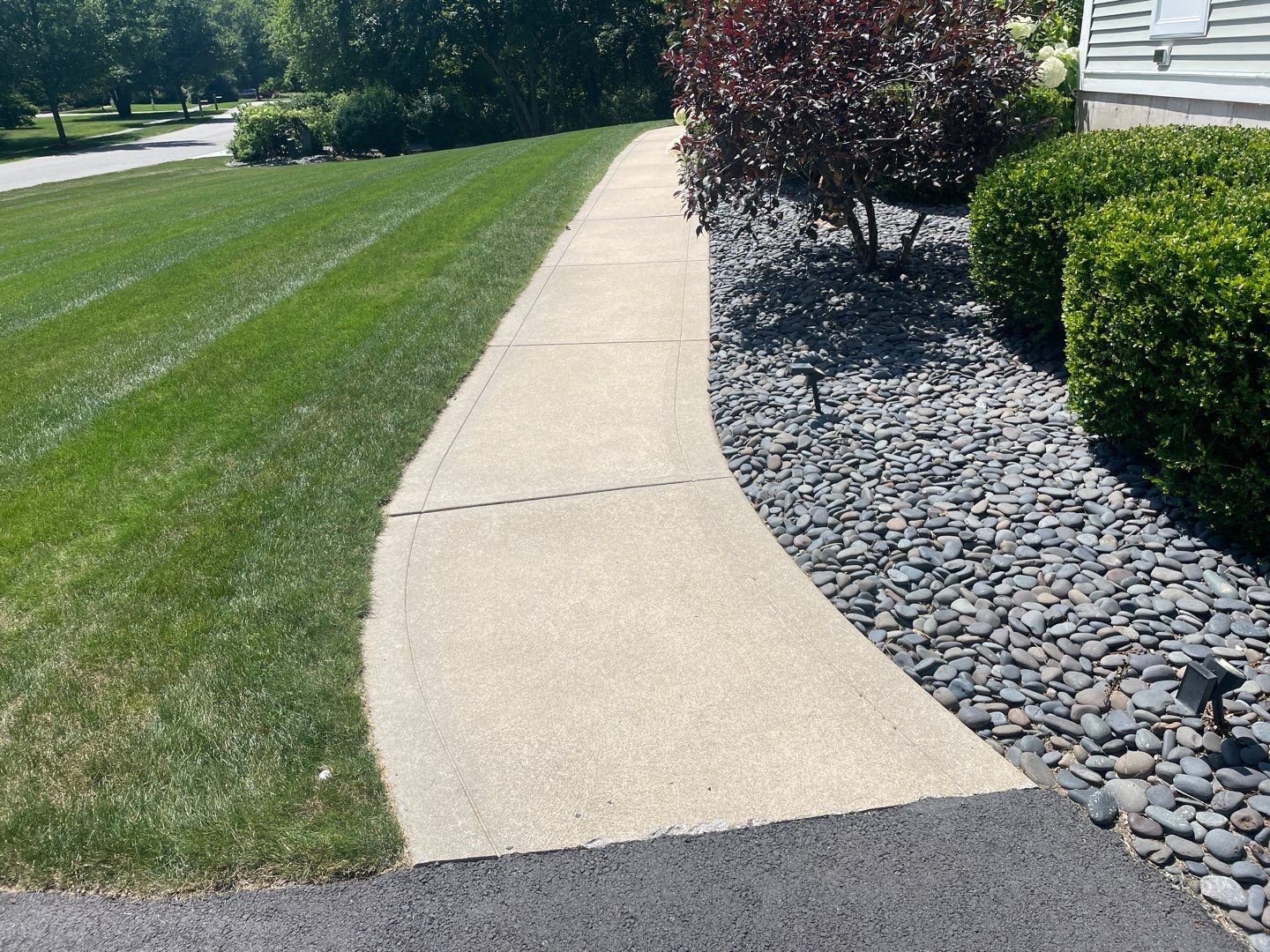 Scarelli Garage & Walkway TransFLOORmation by Symphony Concrete Coatings
