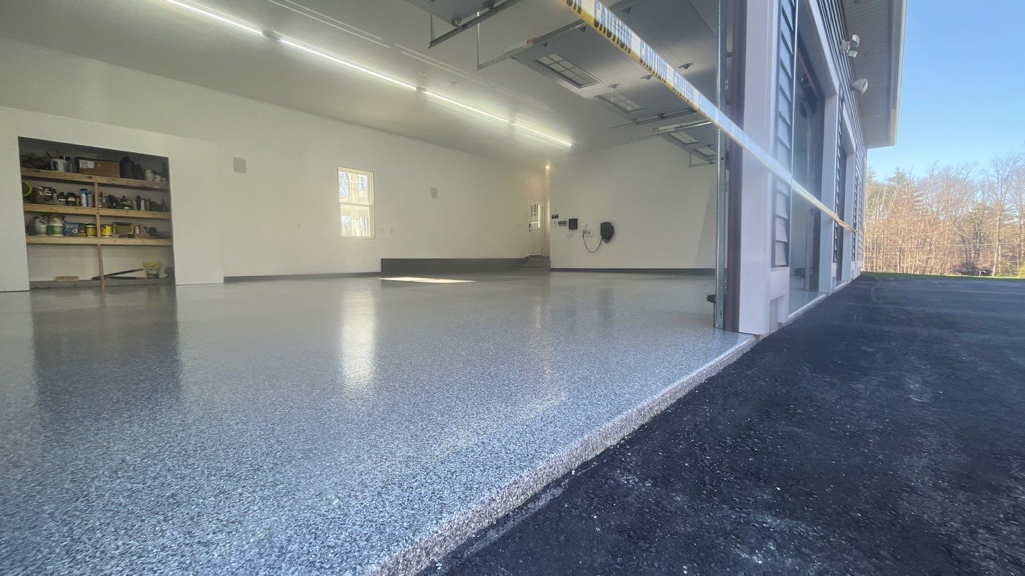 Garage in Londonderry, NH 03053 by Symphony Concrete Coatings
