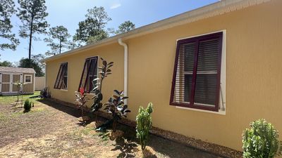 Hurricane Rated Bahama Shutters in Wine Red