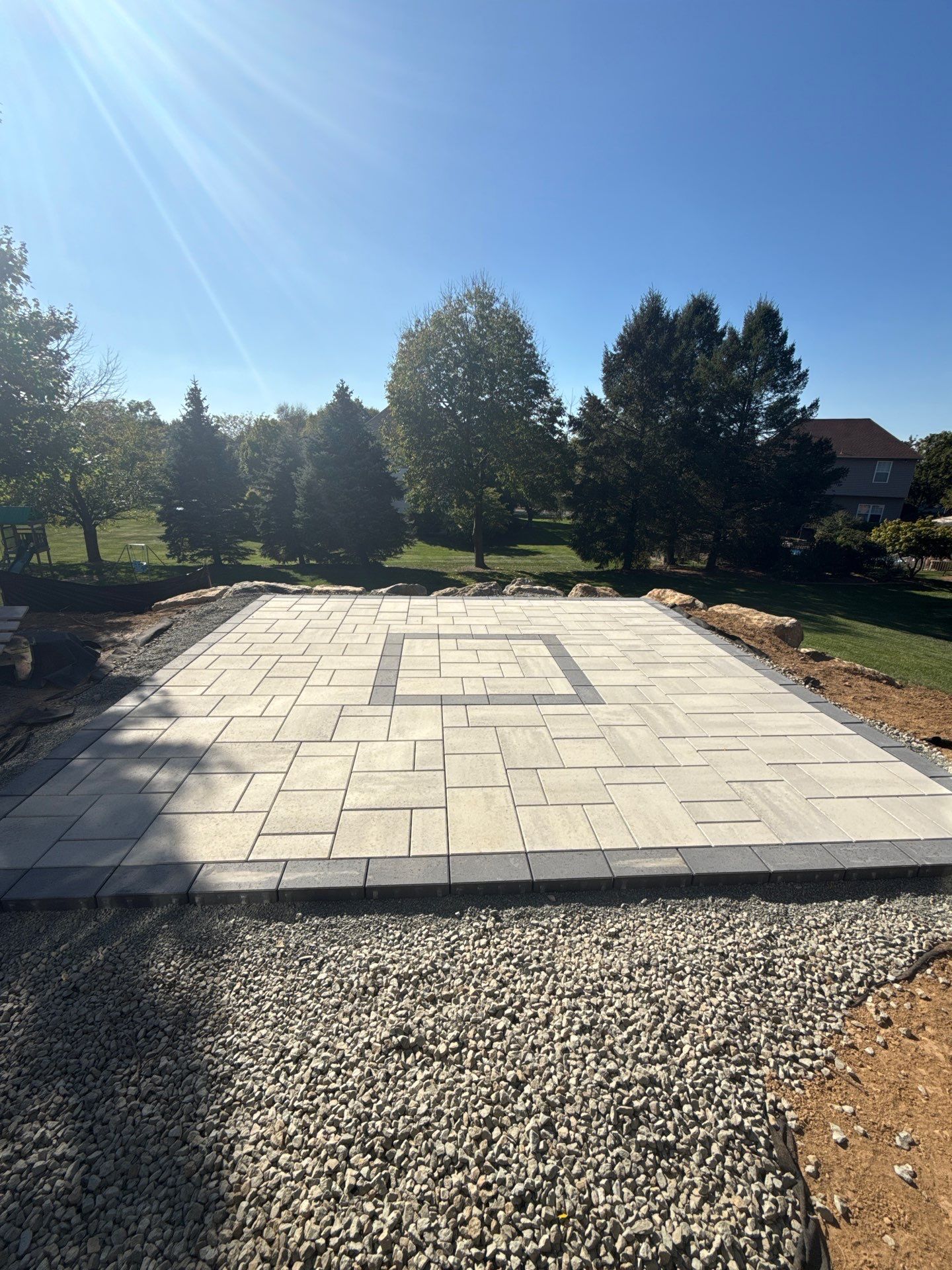 Backyard Retreat: Techo-Bloc Patio + Firepit Lounge by Saylor’s Lawn & Landscape