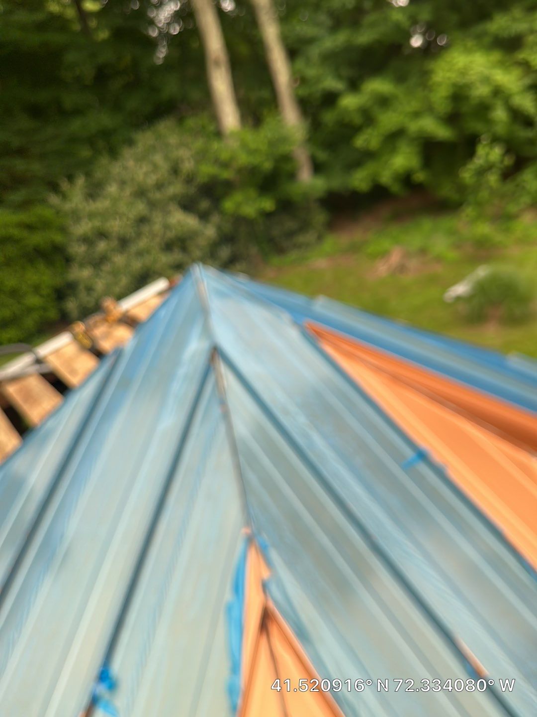 Residential Roofing Installation using Copper Penny Metal Roof by A Plus Exterior