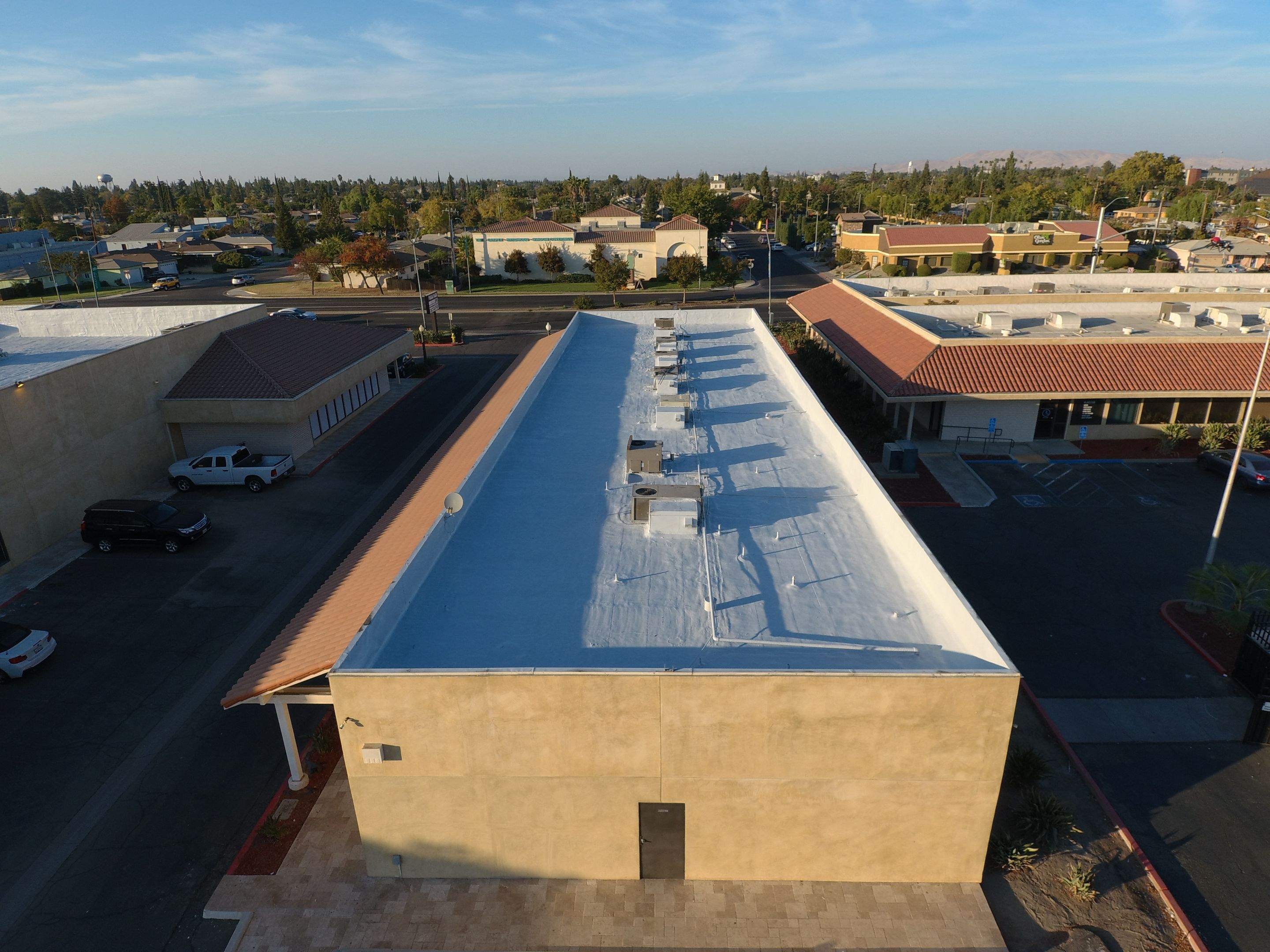 Reburbish existing spray foam job by Straight Edge Roofing Inc