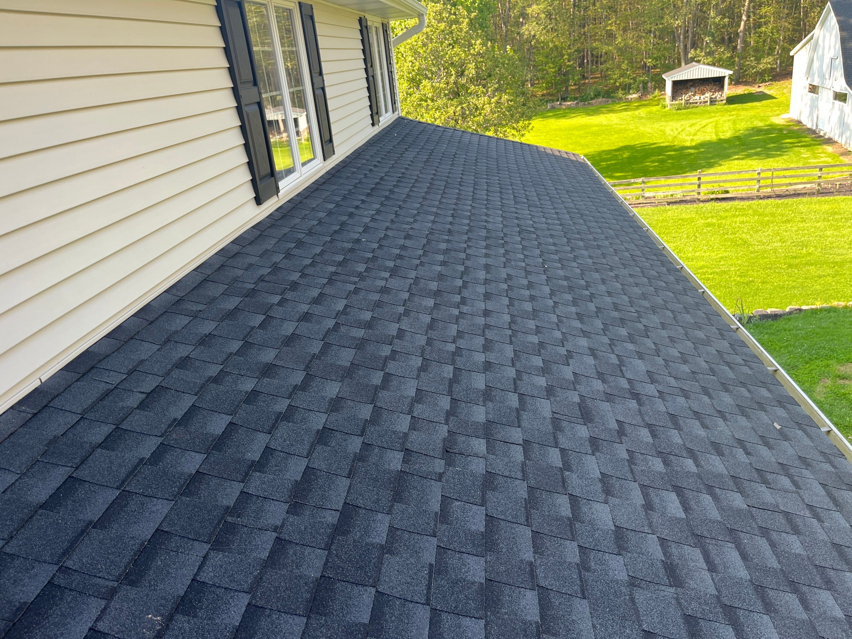 Re-roofing After A Hail Storm in Howell by Acme Exteriors