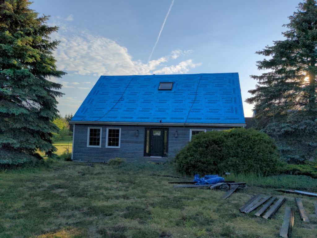 Residential Roofing Installation using 24 Ga Standing Seam Metal  by Jay Carter Roofing & Sheet Metal
