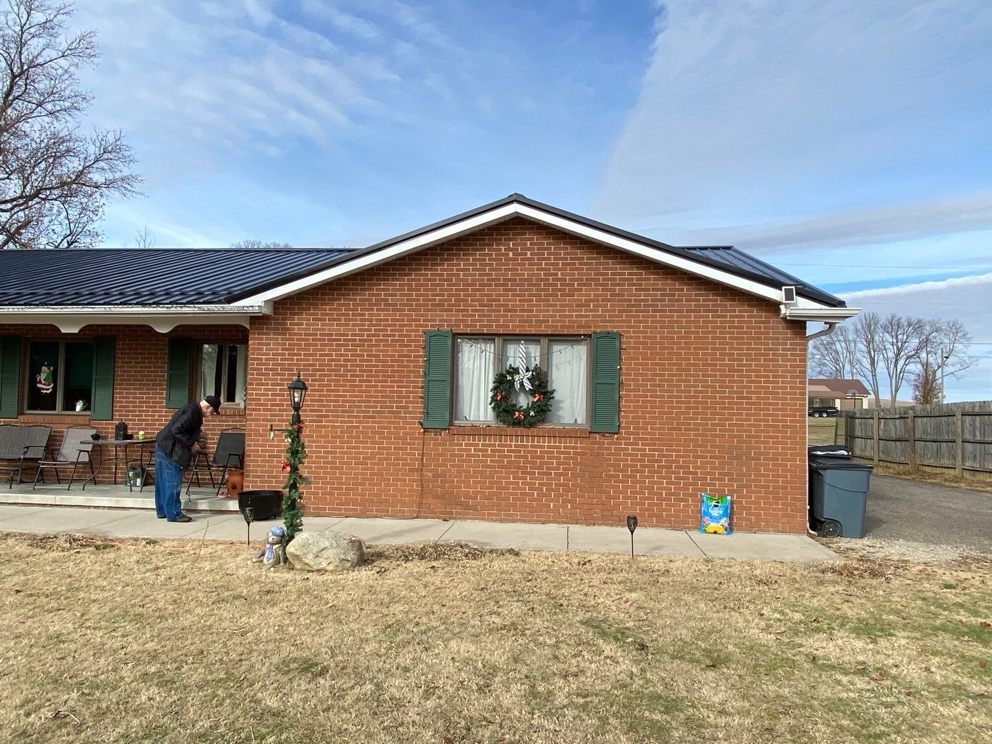 Residential Roofing Installation using Perfromance Panel Metal - Black by RoofX 