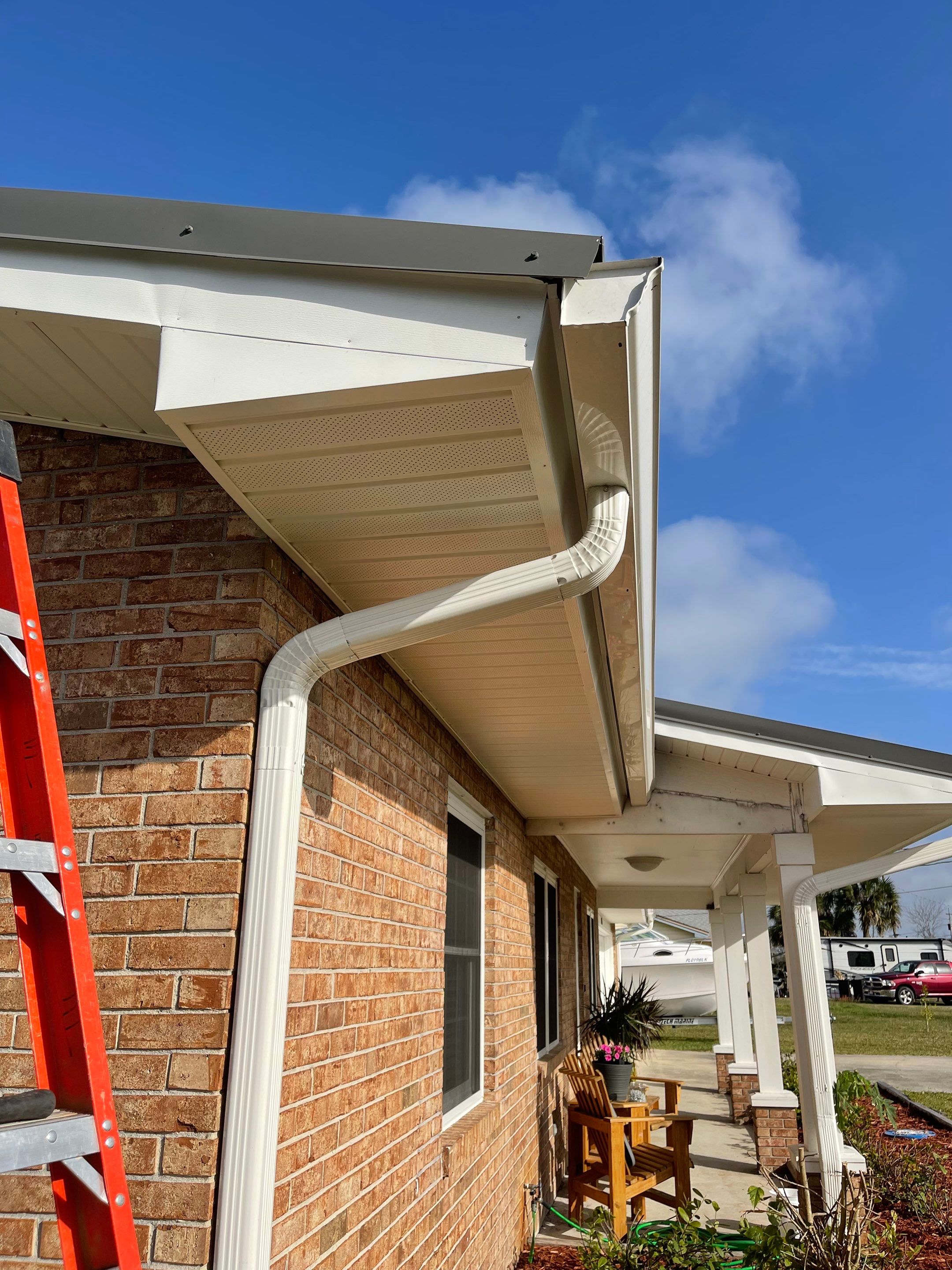 Soffit and Fascia Installation Using White Vinyl Soffit by Gutter Professors