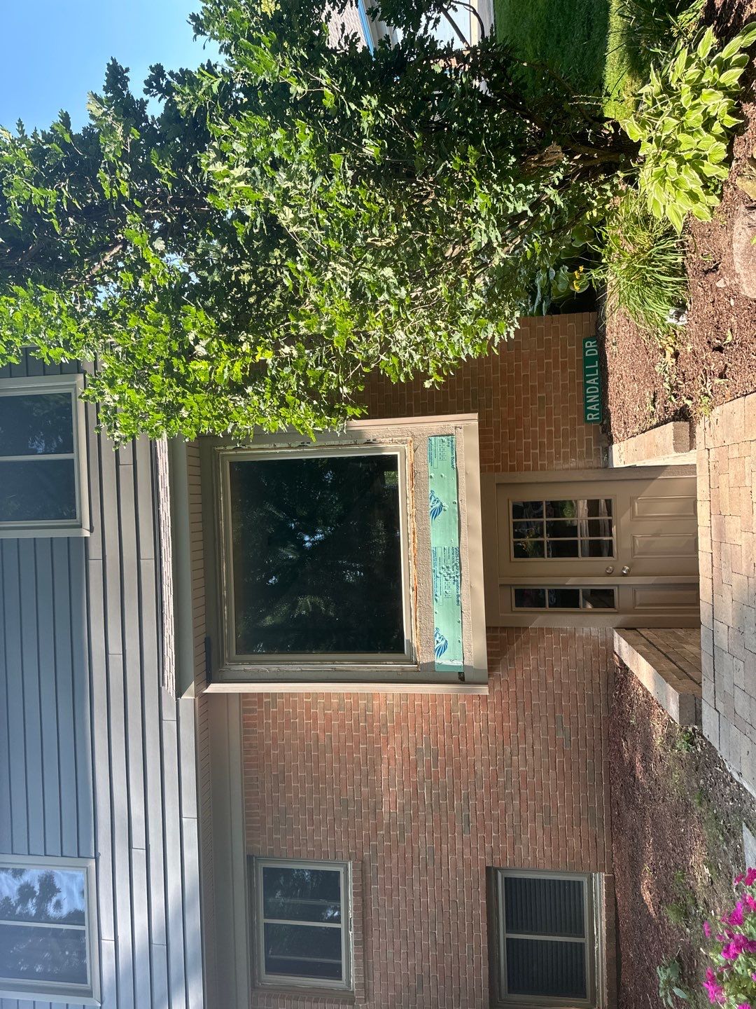 Roof Replacement using Owens Corning Peppercorn and Siding Replacement using Ascend Charcoal Smoke by 180 Contractors